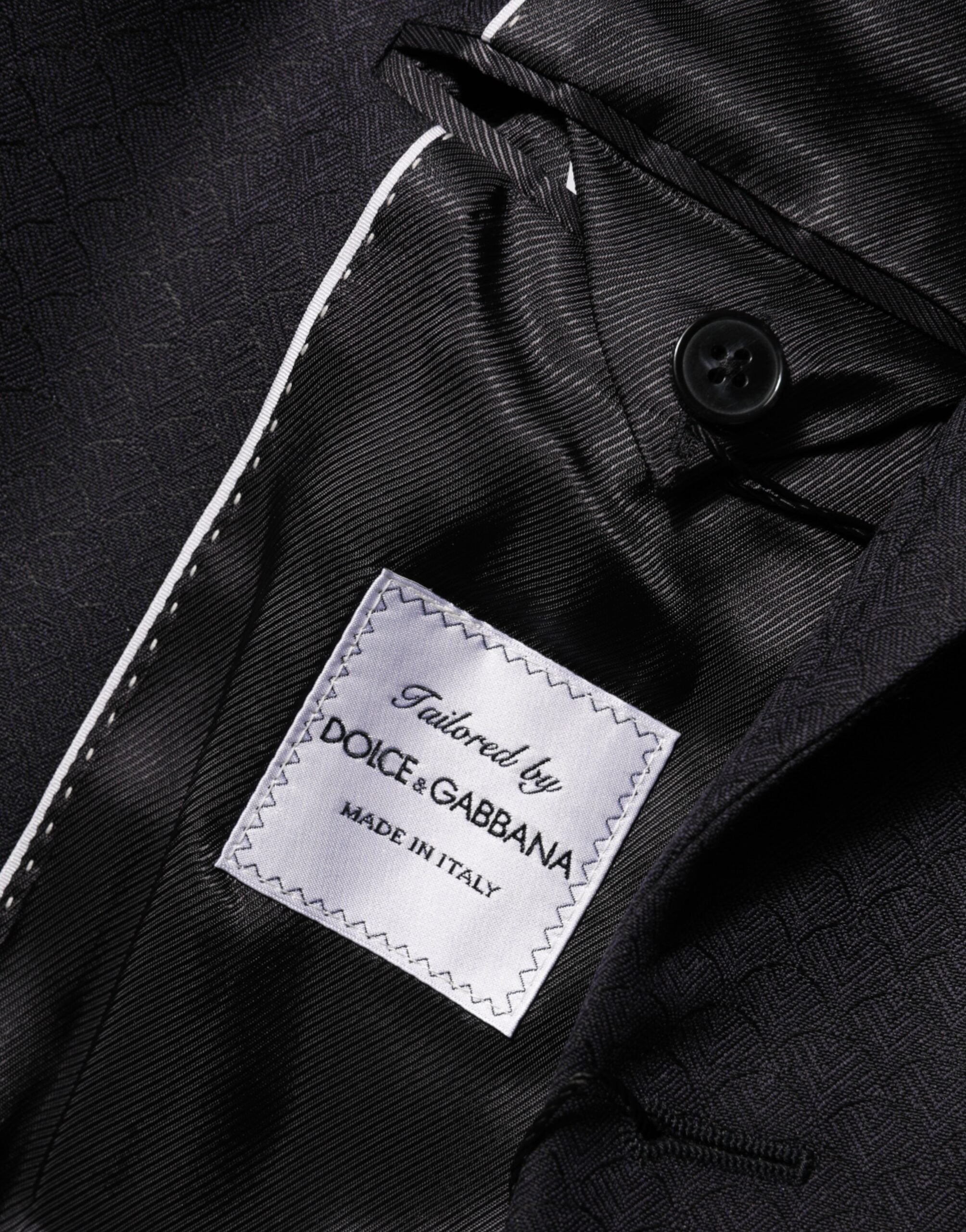 Veste blazer homme Dolce & Gabbana en laine noire avec deux boutons, style élégant et classique.