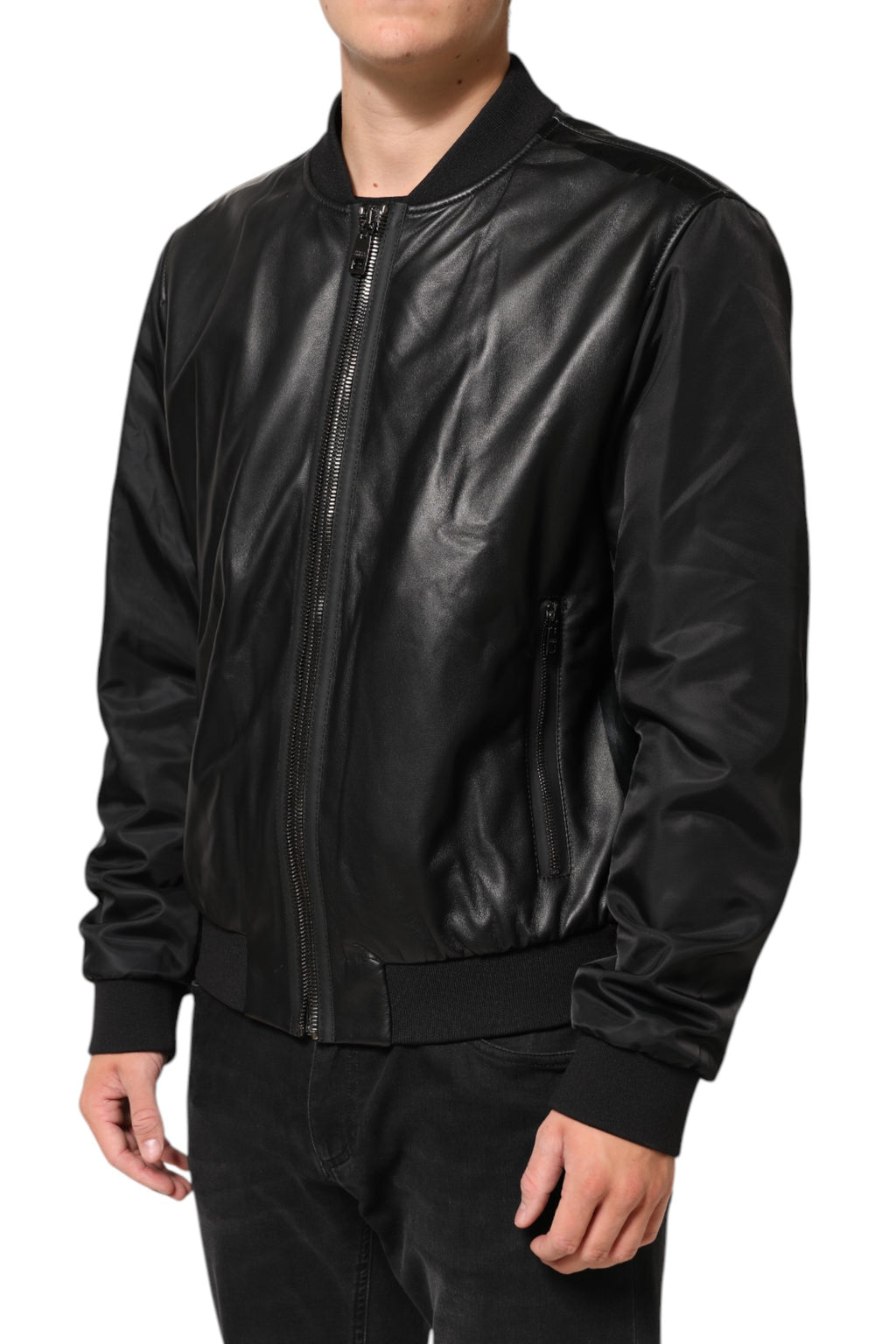 Veste blouson Dolce & Gabbana en cuir noir et nylon avec fermeture éclair complète, style élégant et moderne.
