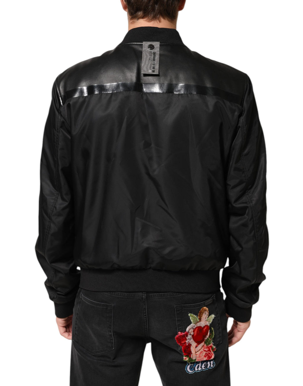 Veste blouson noire en cuir et nylon Dolce & Gabbana avec fermeture éclair complète, style moderne et élégant.