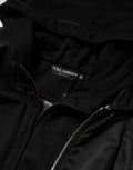 Veste bomber noire en coton avec capuche et zip complet de Dolce & Gabbana, mode élégante et décontractée.
