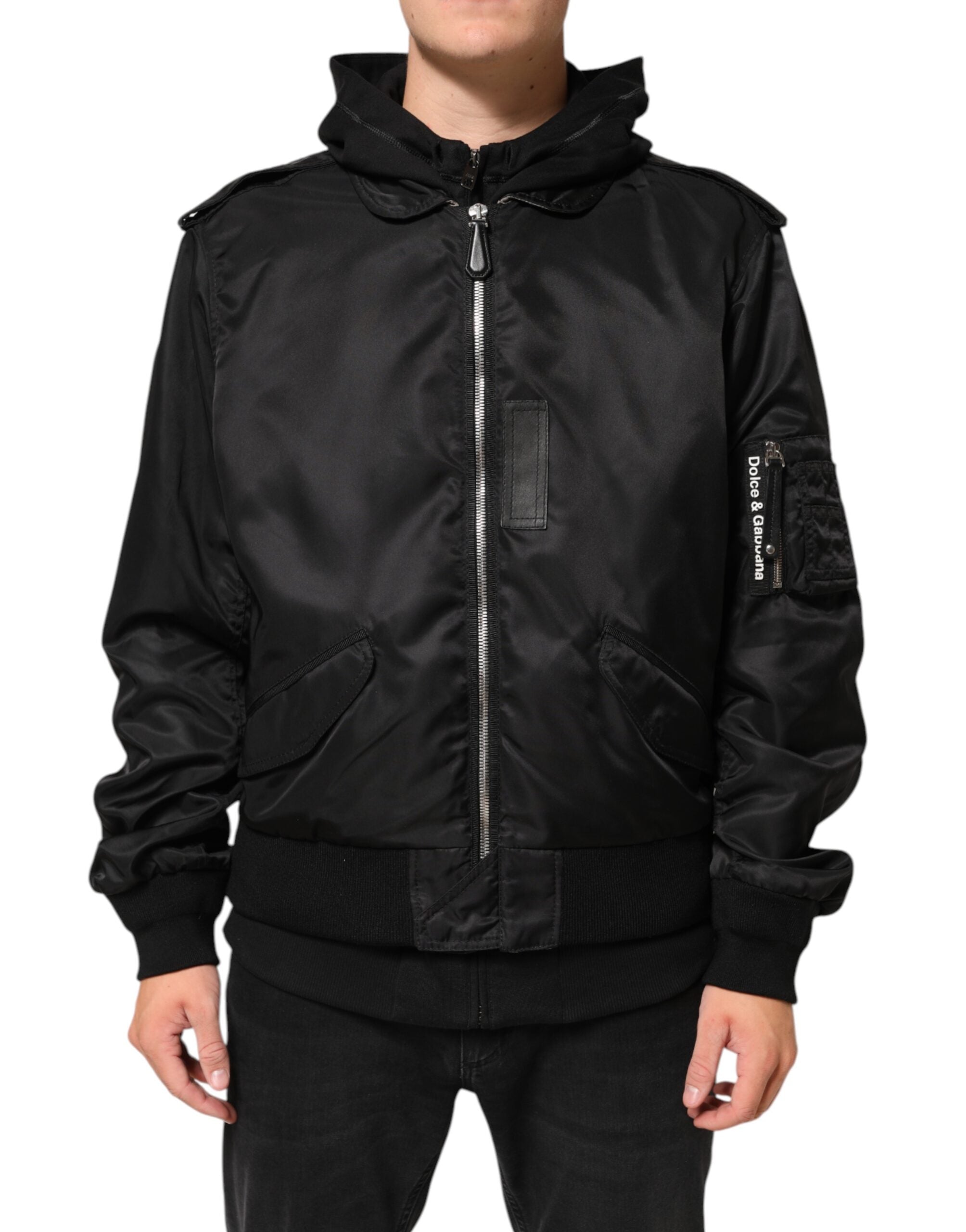 Veste bomber noire en coton avec capuche et zip complet de Dolce & Gabbana, détail de la veste visible.