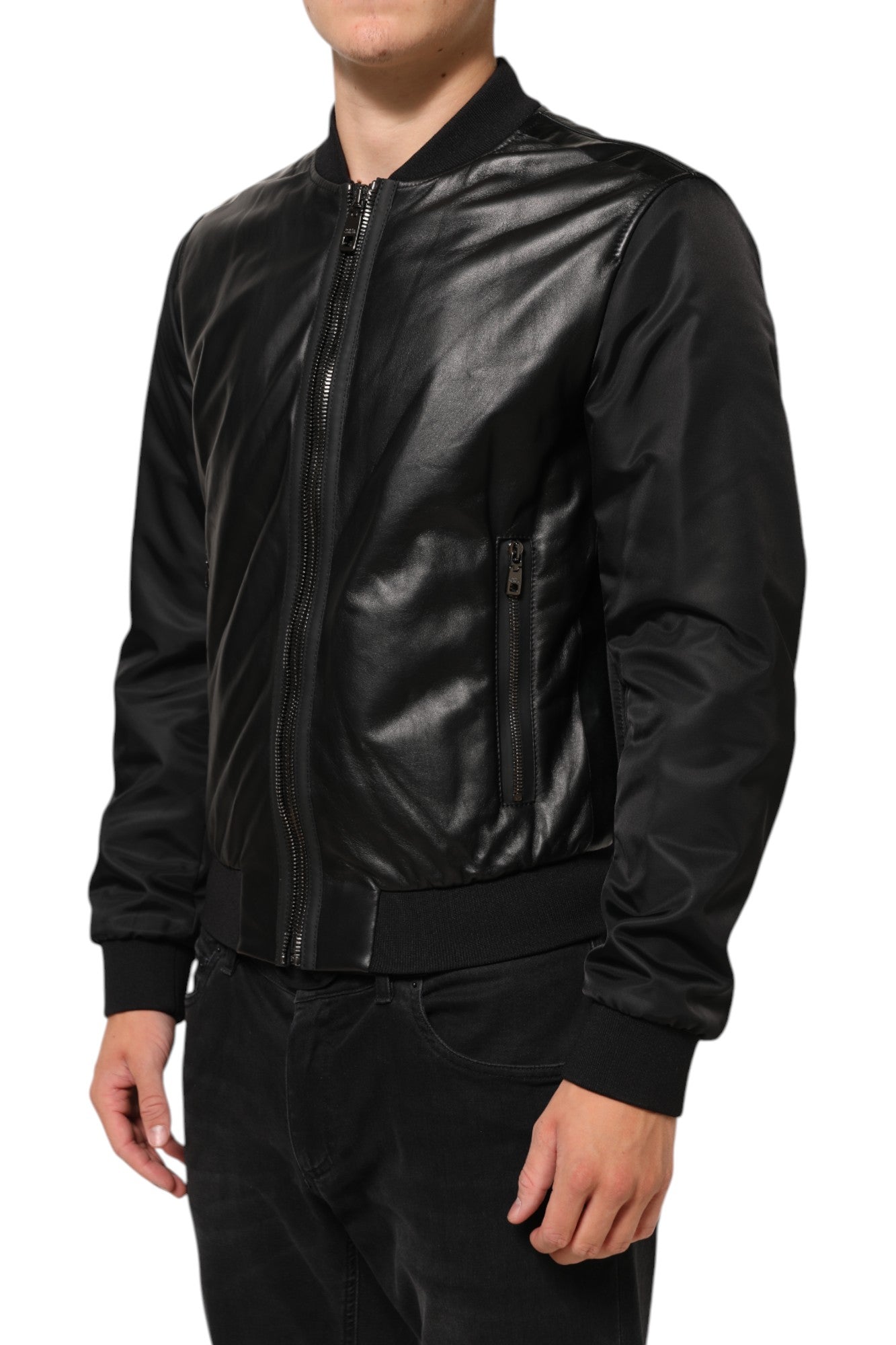 Veste blouson noire en cuir et nylon de Dolce & Gabbana, fermeture éclair intégrale, style élégant et moderne.