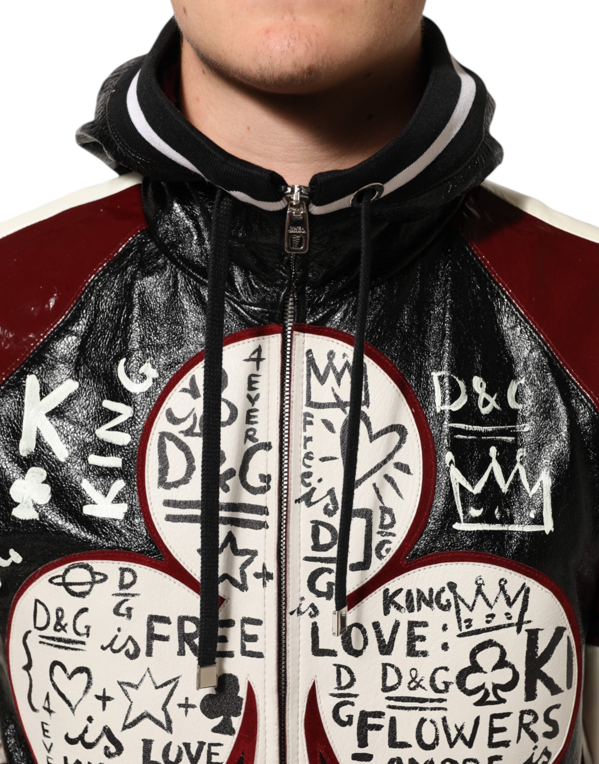 Blouson en cuir pour homme Dolce & Gabbana DG King, multicolore, à capuche et style biker, visible sur fond neutre.