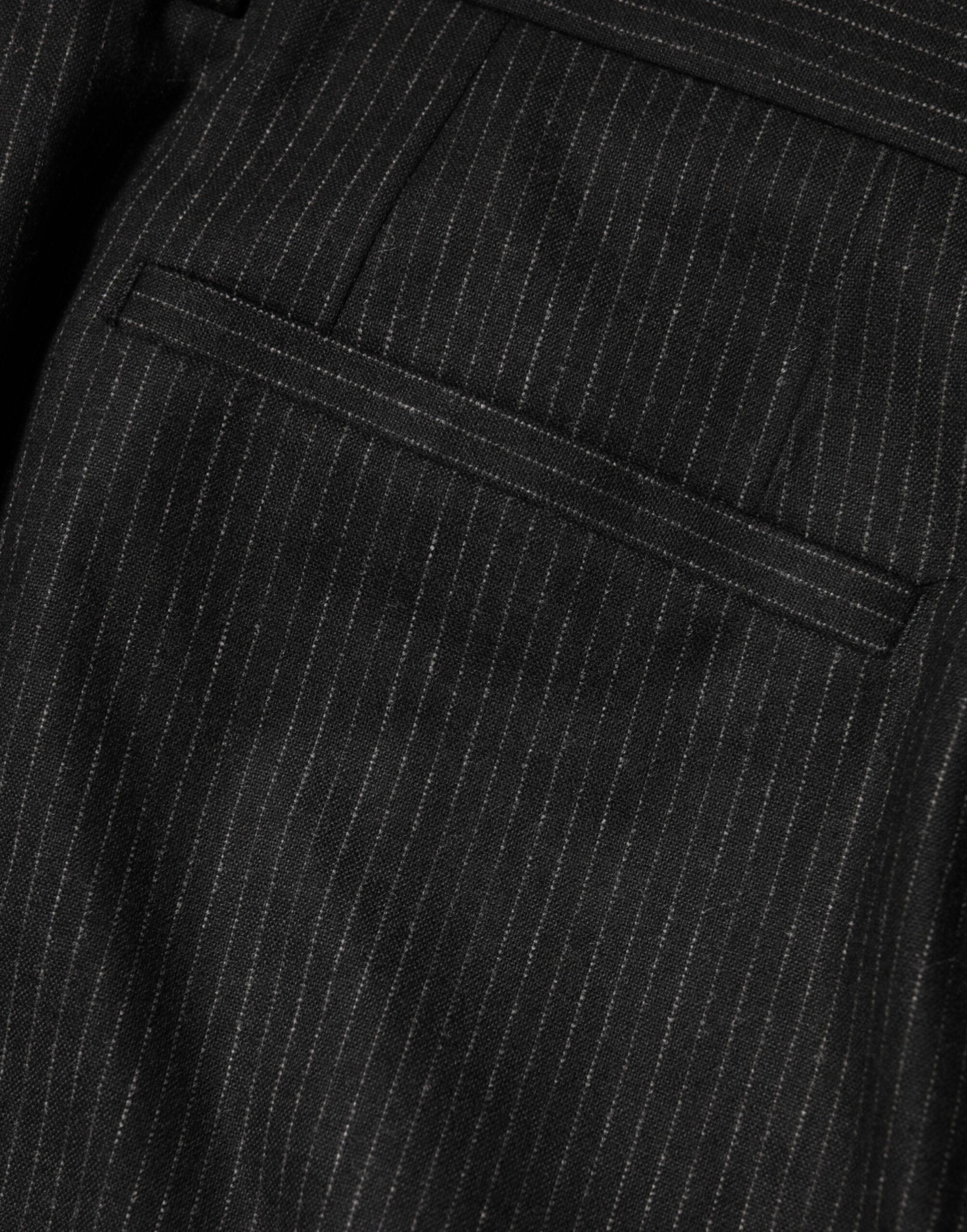 Pantalon noir en coton Dolce & Gabbana, pantalon taille moyenne, style décontracté et élégant, visible sur fond neutre.