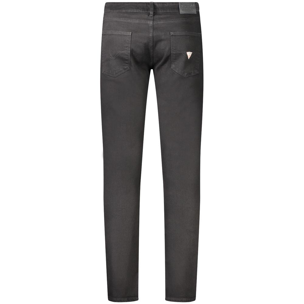 Jeans skinny noirs pour homme en coton de la marque Guess Jeans, coupe ajustée et style moderne.