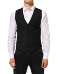 Gilet homme en laine noire de la marque Dolce & Gabbana, costume formel élégant et ajusté avec boutons devant.