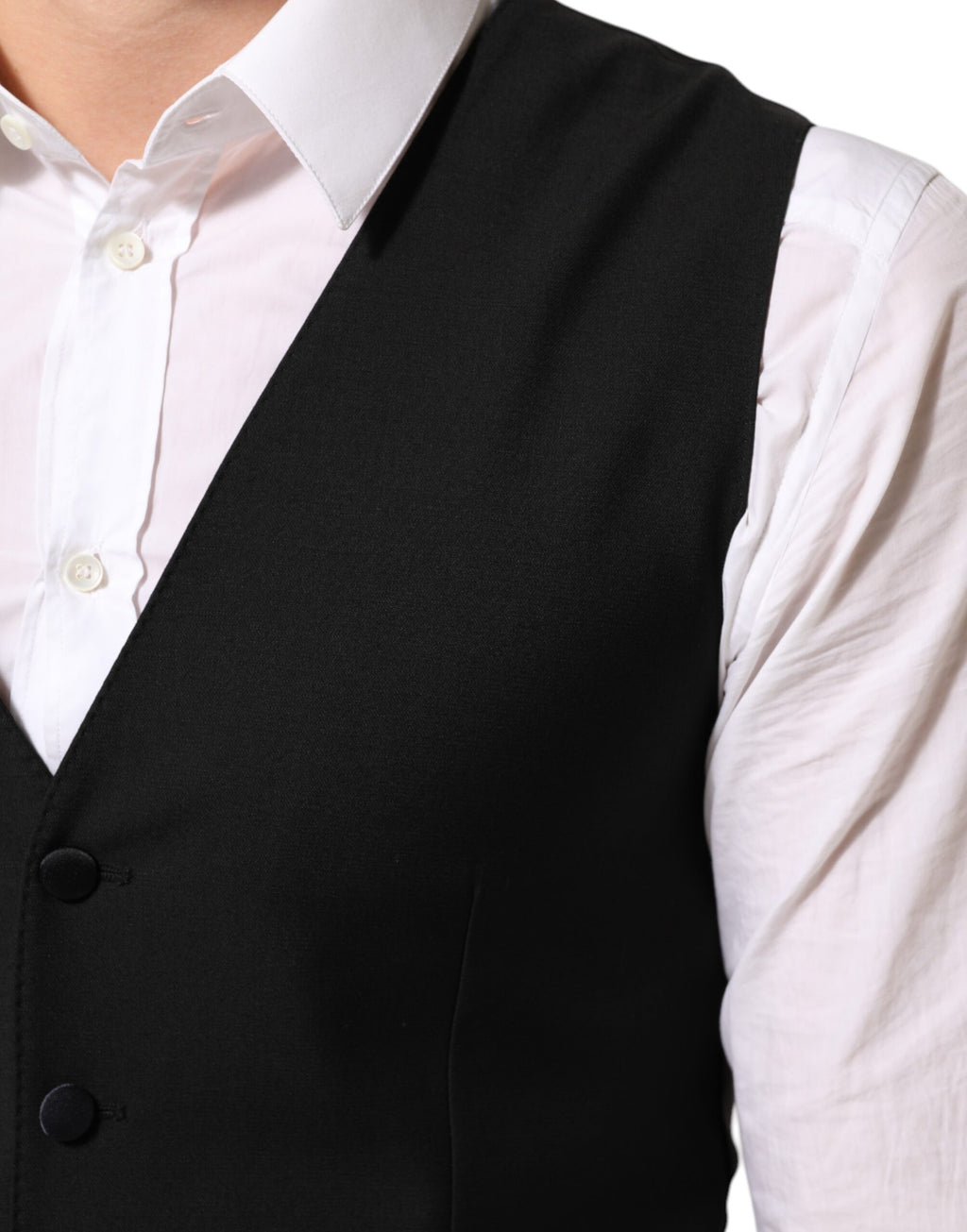 Gilet homme en laine noire Dolce & Gabbana, vêtement formel avec coupe élégante et détails classiques.