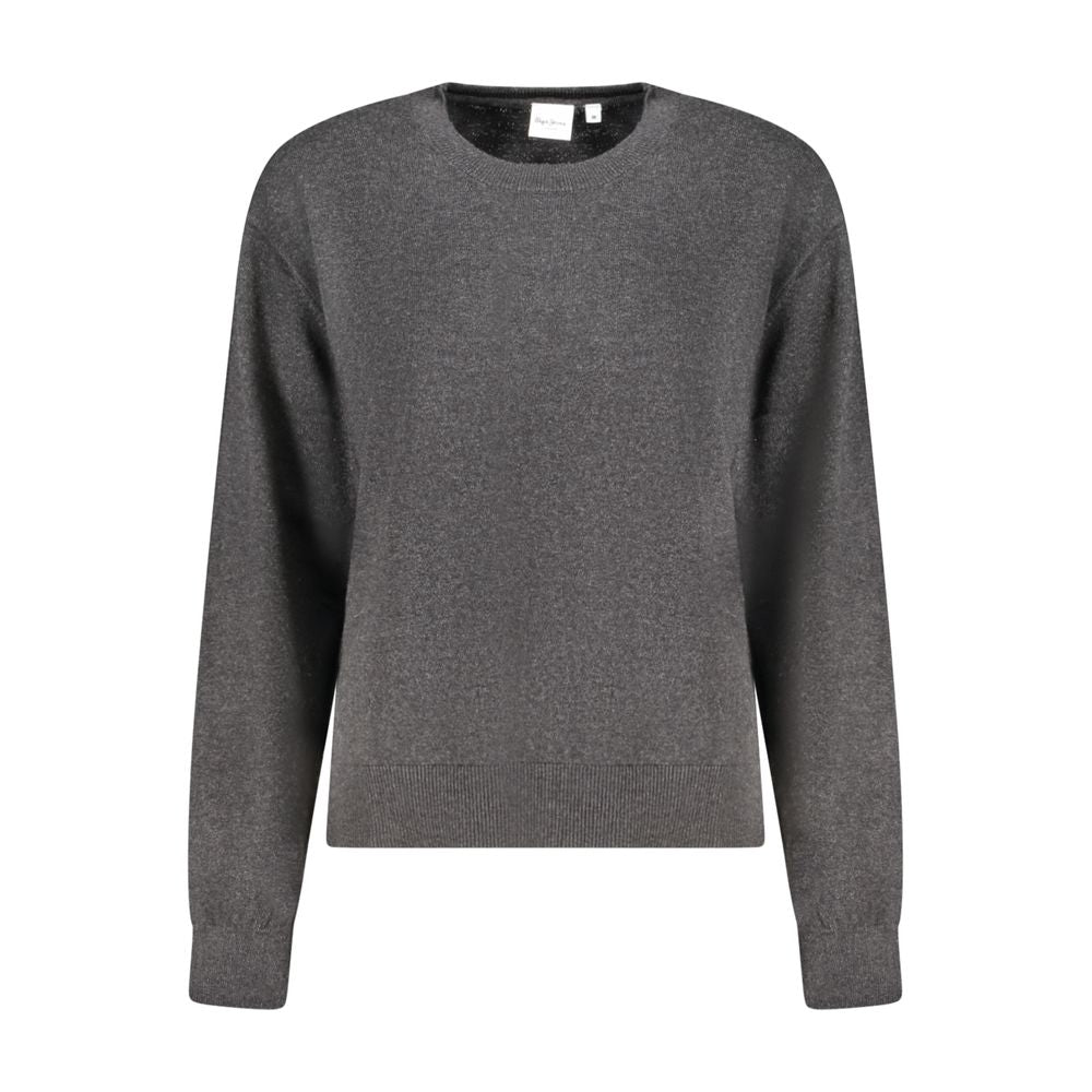 Pull en coton noir pour femmes de Pepe Jeans, coupe confortable et style décontracté, porté avec des détails visibles.