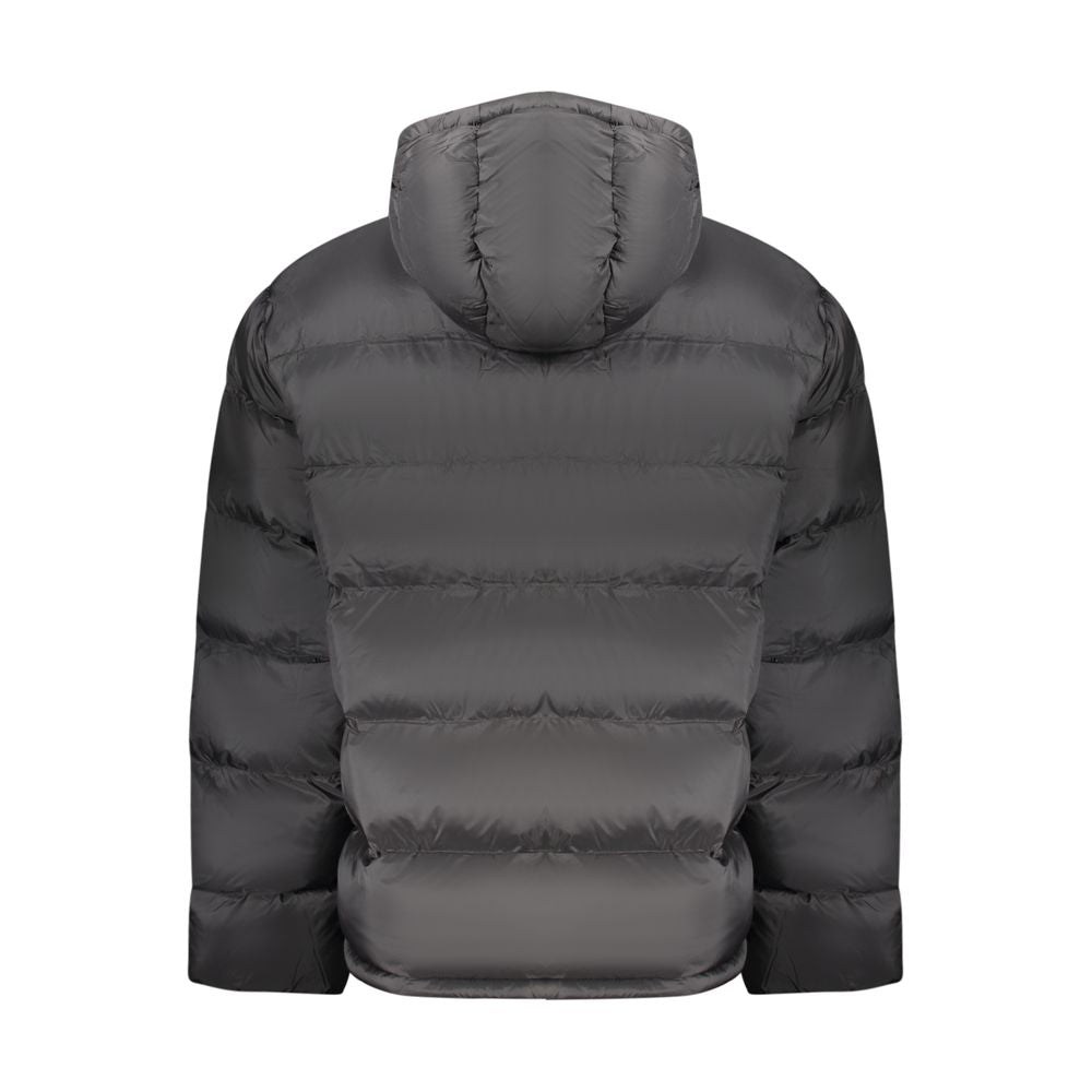 Veste homme en polyamide noire de la marque Calvin Klein, avec coupe moderne et détails élégants.