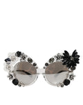 Lunettes de soleil rondes transparentes Dolce & Gabbana DG4292 avec fleurs en cristaux, style élégant et sophistiqué.