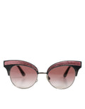 Lunettes de soleil Dolce & Gabbana noires et roses avec monture en miroir et forme œil de chat ornée de sequins.
