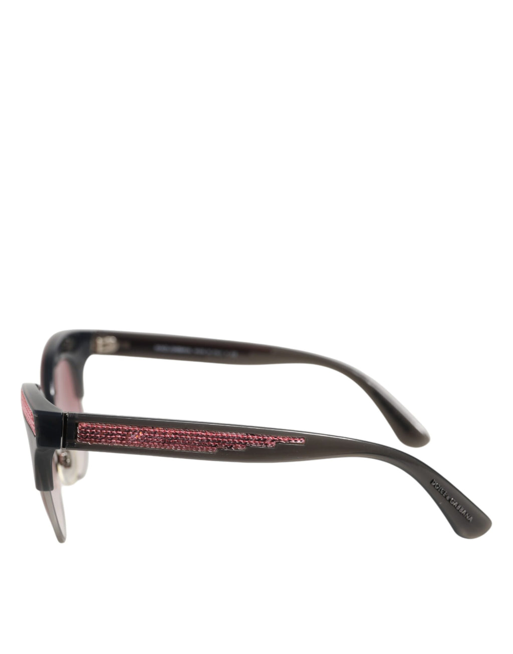 Lunettes de soleil Dolce & Gabbana noires et roses, miroir, œil de chat avec sequins, style élégant et tendance.