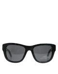 Lunettes de soleil Dolce & Gabbana DG4177 avec monture en cuir noir et verres teintés, style moderne et élégant.