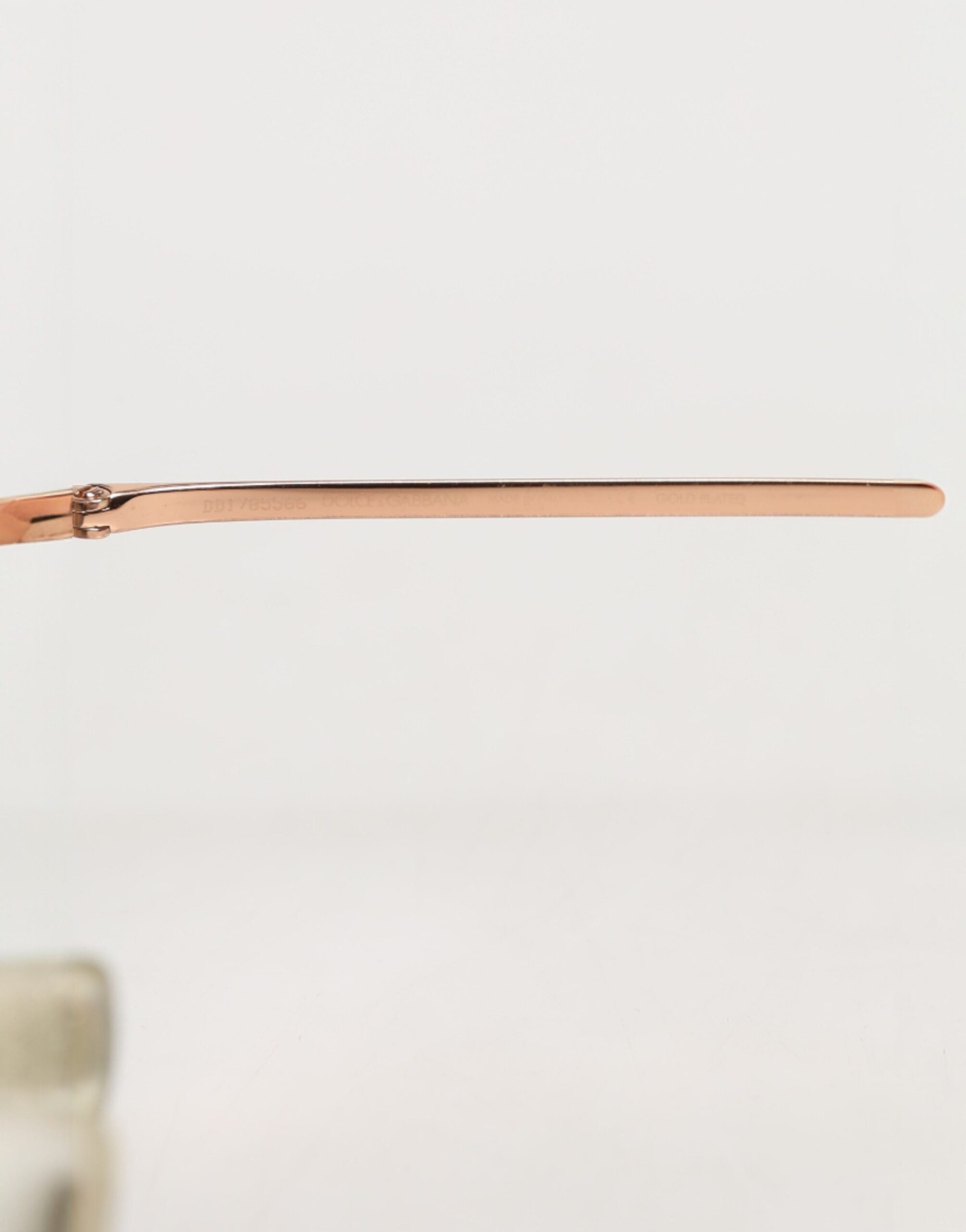 Lunettes de soleil rondes Dolce & Gabbana DG2215K en métal doré, monture ronde élégante pour un style sophistiqué.