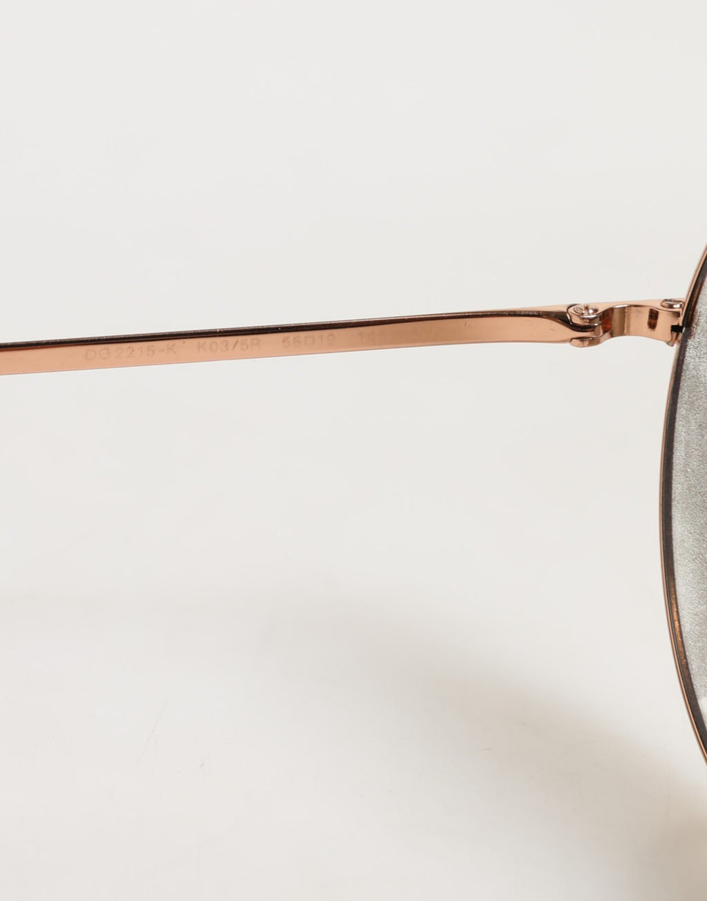Lunettes de soleil rondes en métal doré Dolce & Gabbana DG2215K, lunettes de soleil élégantes et modernes.