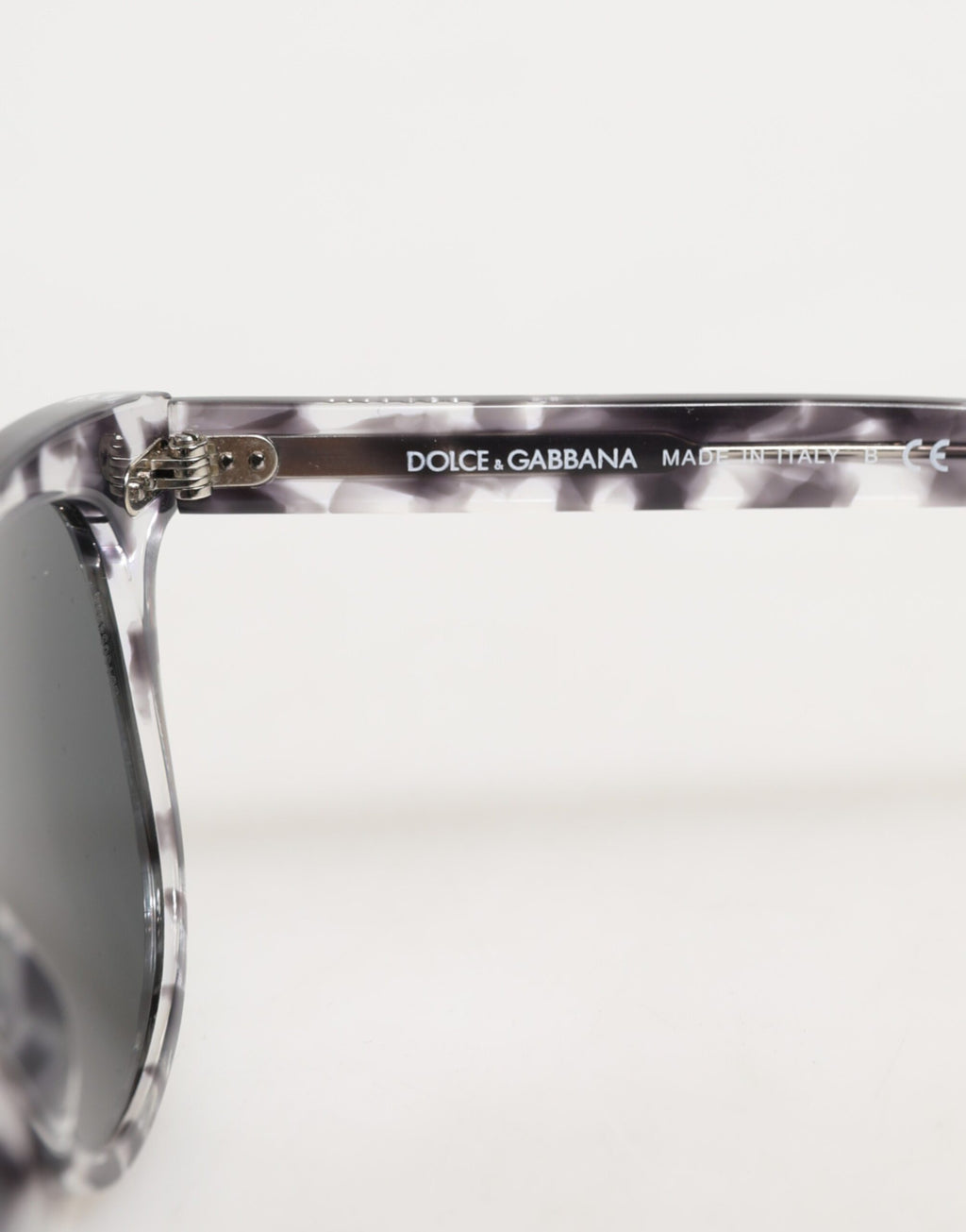 Lunettes de soleil Dolce & Gabbana DG4254 Havana avec verres teintés noirs et clairs, style élégant et moderne.