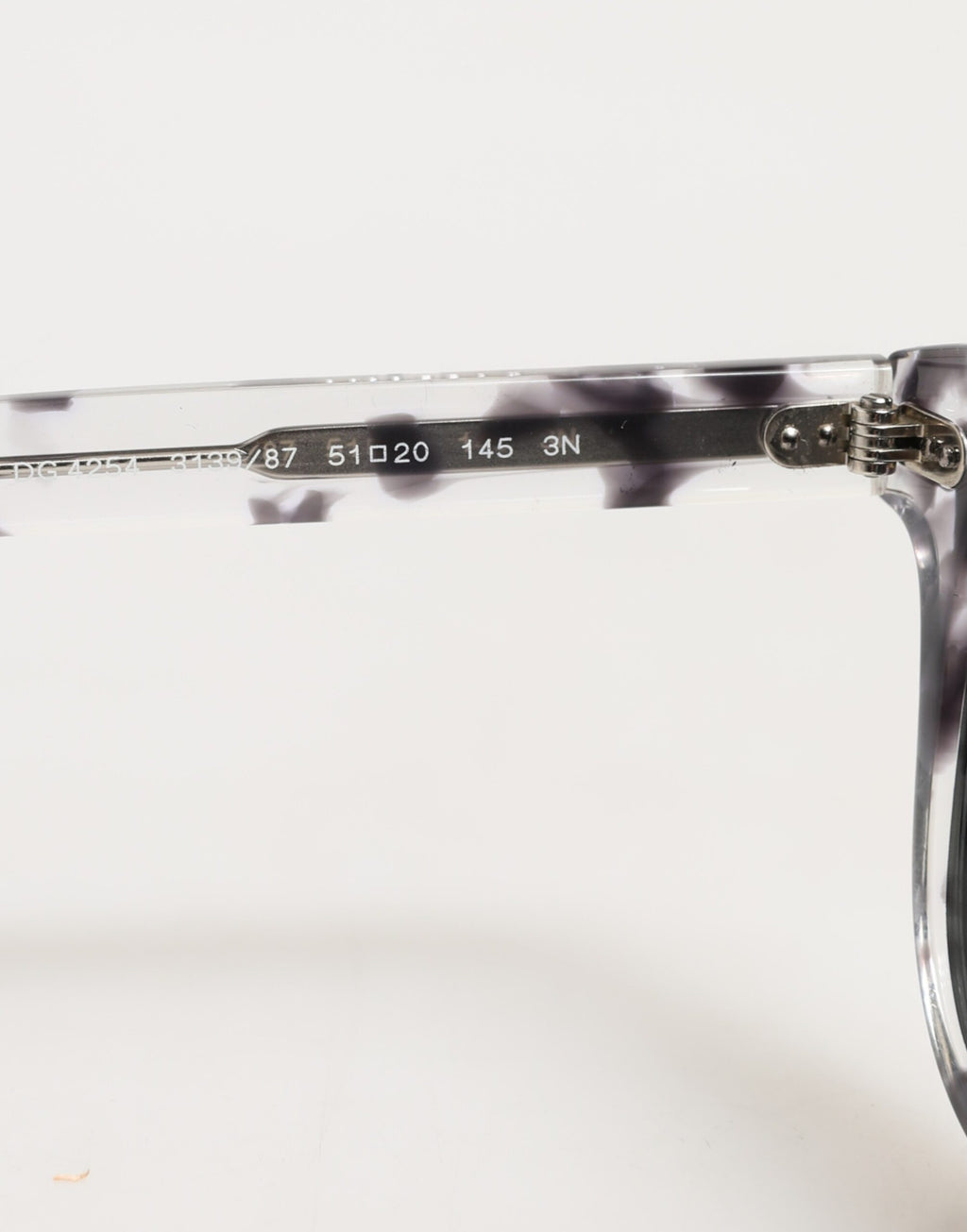 Lunettes de soleil Dolce & Gabbana DG4254 Havana avec verres teintés noirs et monture élégante.