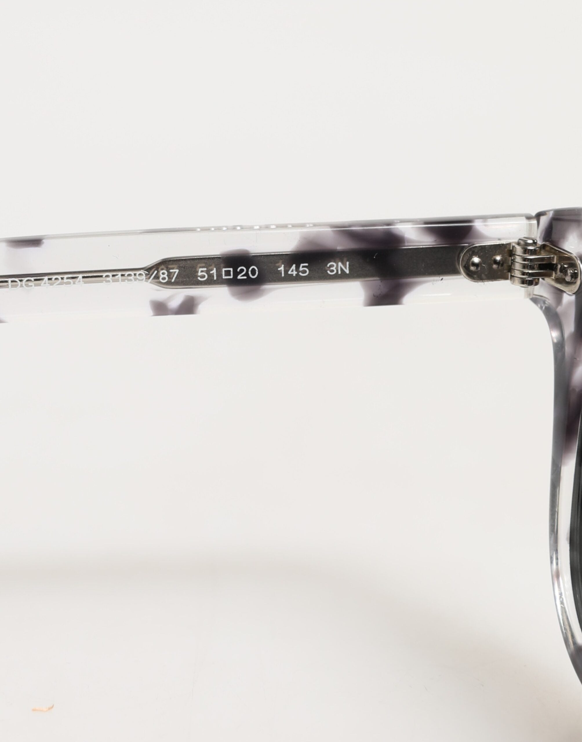 Lunettes de soleil Dolce & Gabbana DG4254 Havana avec verres teintés noirs et monture élégante.