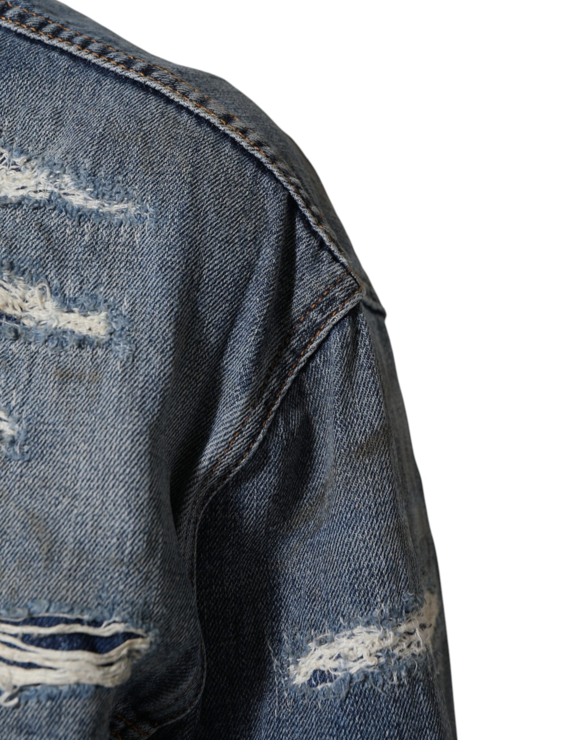 Veste en jean déchirée en coton bleu de Dolce & Gabbana, style décontracté et tendance.