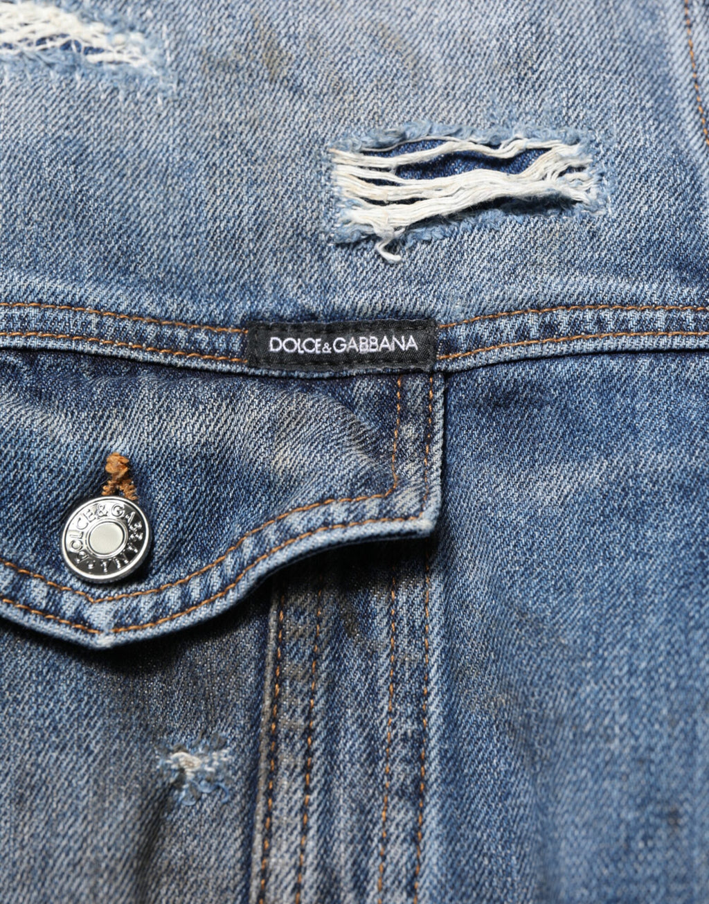 Veste en jean bleue déchirée en coton Dolce & Gabbana, style décontracté avec détails usés et coupe moderne.