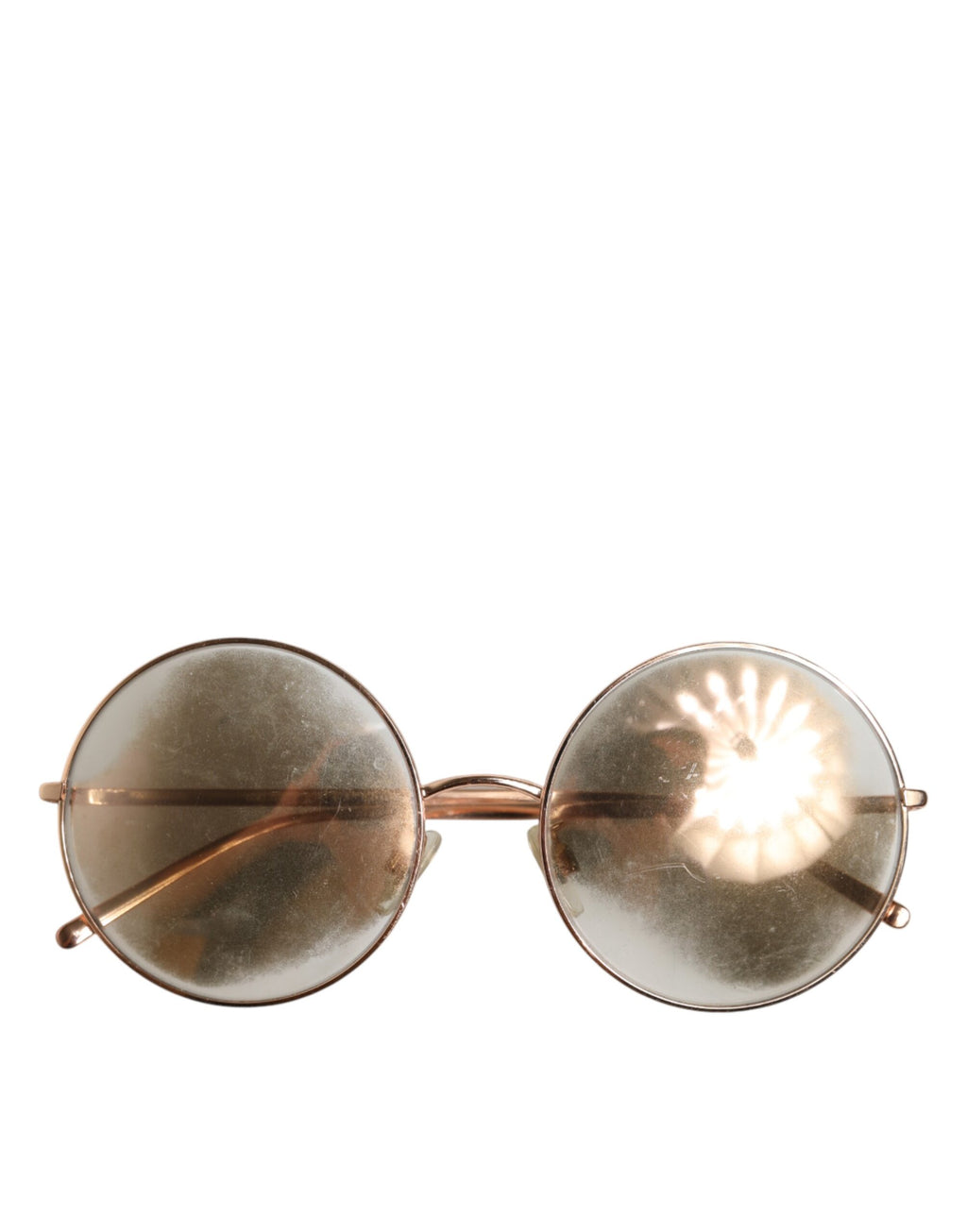 Lunettes de soleil Dolce & Gabbana avec monture ronde plaquée or rose et verres teintés, mode élégante et sophistiquée.