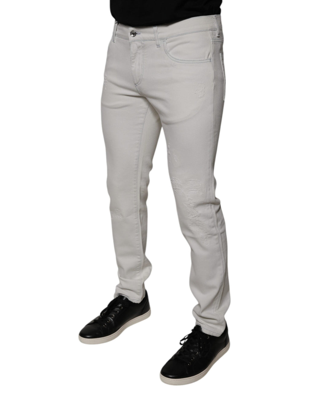 Jean homme skinny en coton stretch blanc Dolce & Gabbana, coupe ajustée et détails classiques.