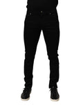Jeans homme Dolce & Gabbana en coton noir, coupe slim, stretch, denim, visible détail de la poche arrière et couture.