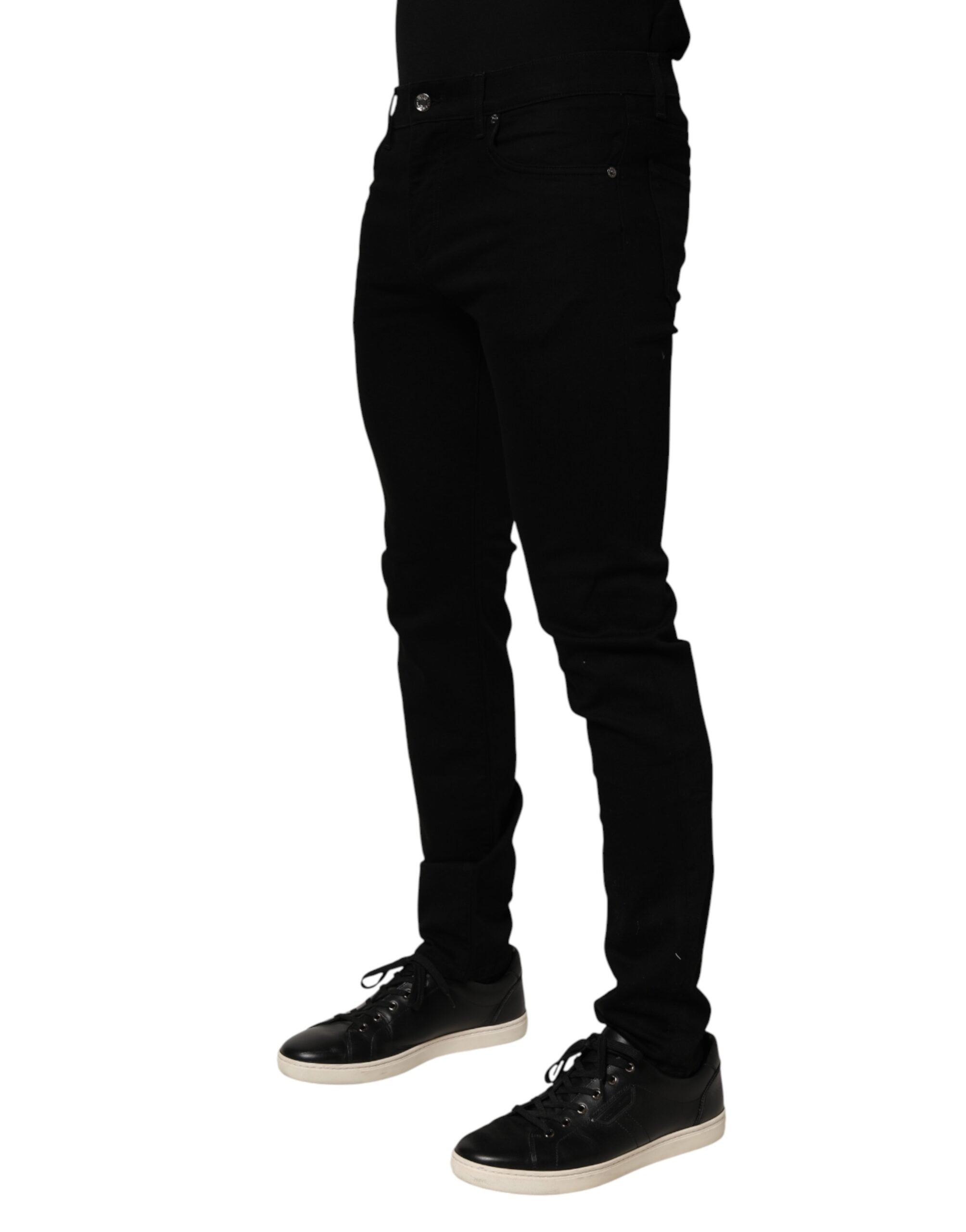 Jeans slim en coton stretch noir de Dolce & Gabbana pour homme, coupe ajustée et moderne, en denim de qualité.