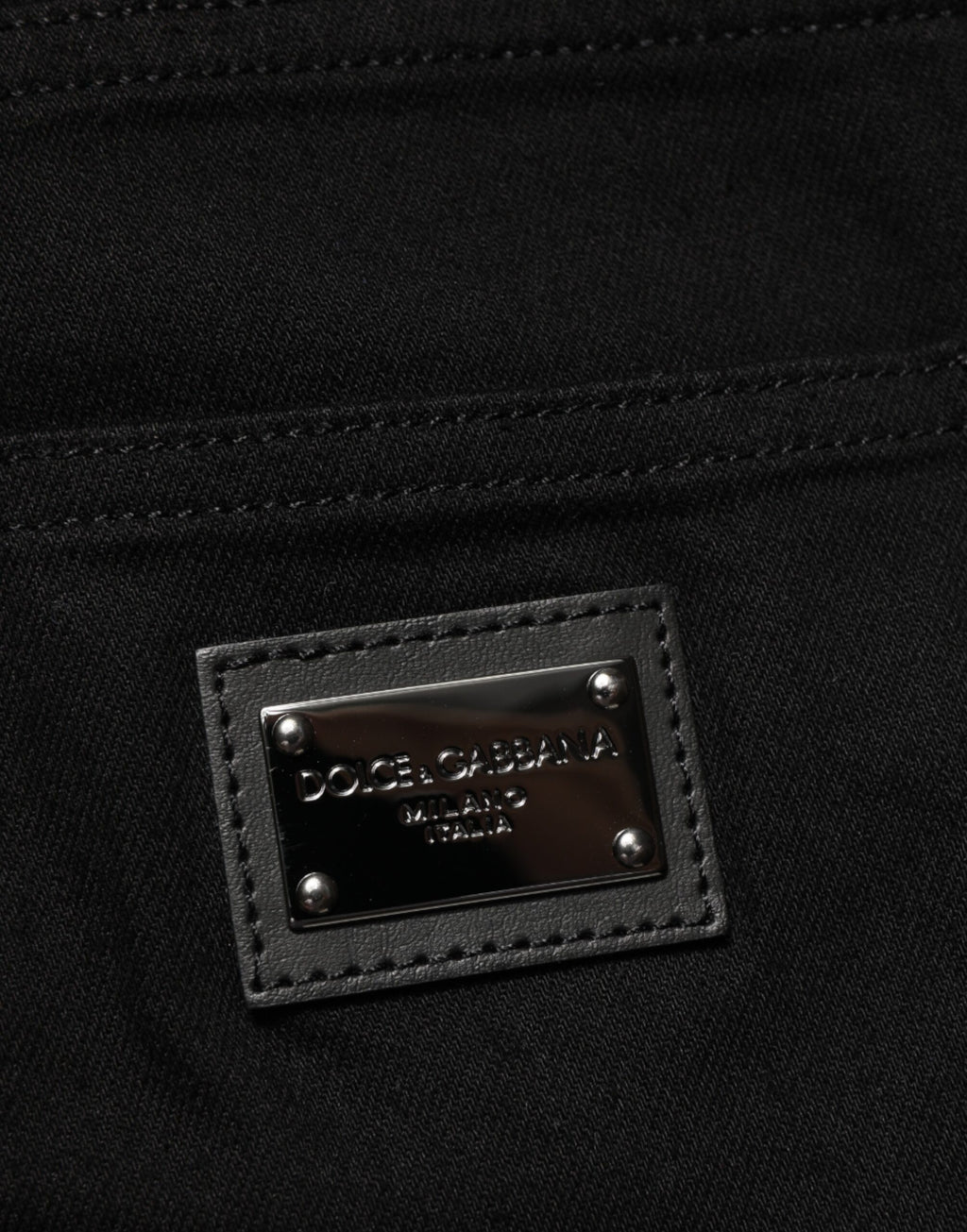 Jeans slim en coton stretch noir pour homme de Dolce & Gabbana, coupe ajustée et détails classiques en denim.