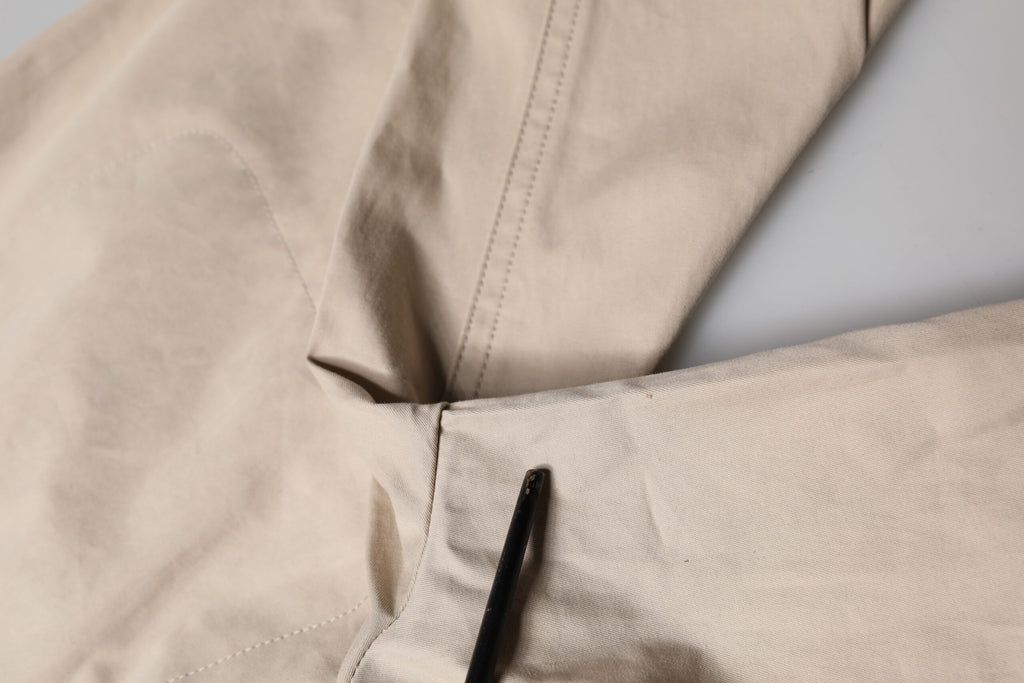Pantalon cargo beige en coton pour homme de la marque Dolce & Gabbana, coupe tapered et style décontracté.