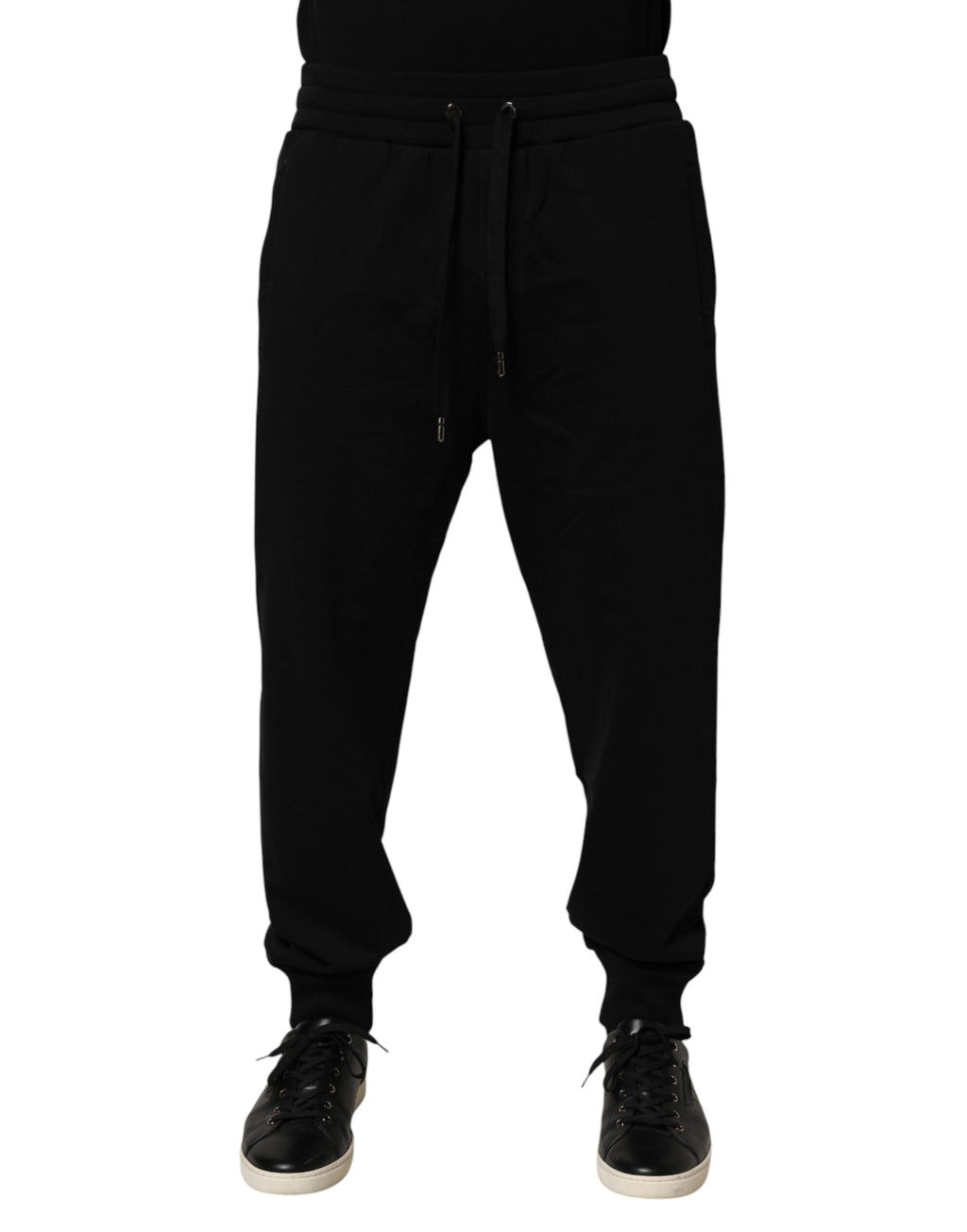 Pantalon de jogging en coton noir Dolce & Gabbana avec logo DG, coupe décontractée et bande élastique à la taille.