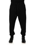 Pantalon de jogging en coton noir Dolce & Gabbana avec logo DG, coupe décontractée et bande élastique à la taille.