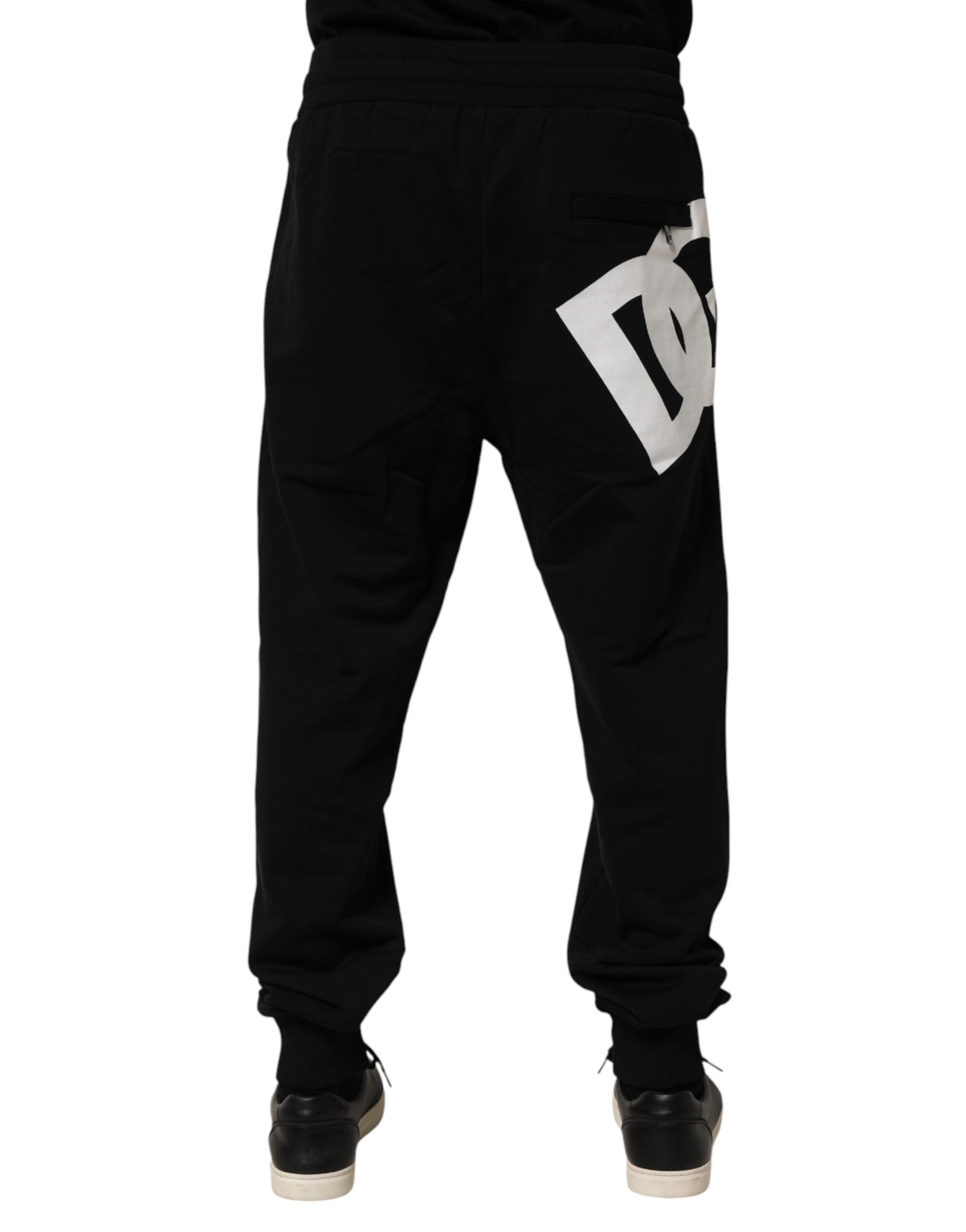 Pantalon jogging en coton noir Dolce & Gabbana avec logo DG, coupe décontractée et détails modernes.