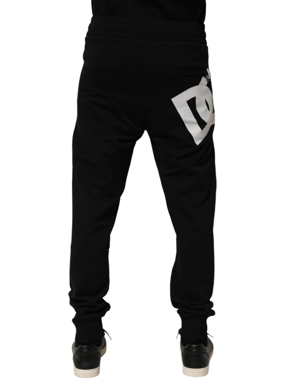 Pantalon jogger Dolce & Gabbana en coton noir avec logo DG, confort et style décontracté.