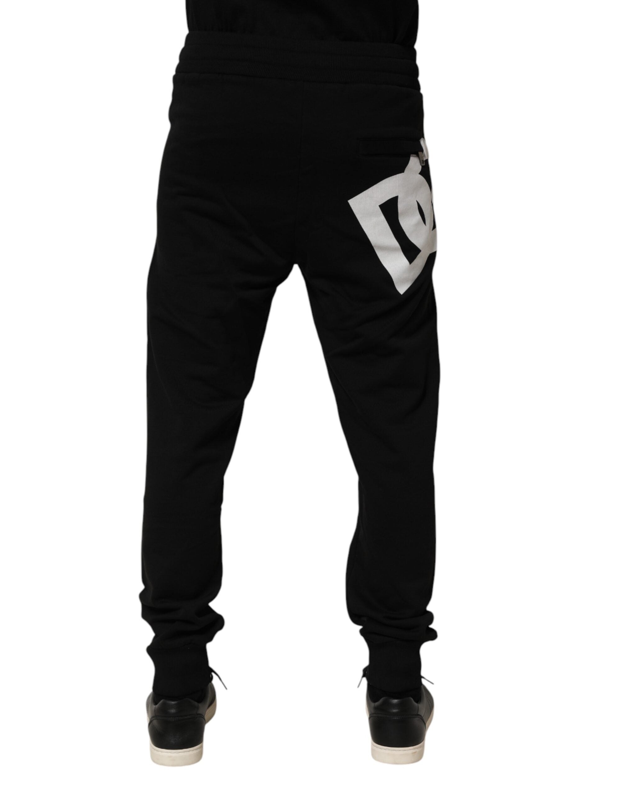 Pantalon jogger Dolce & Gabbana en coton noir avec logo DG, confort et style décontracté.