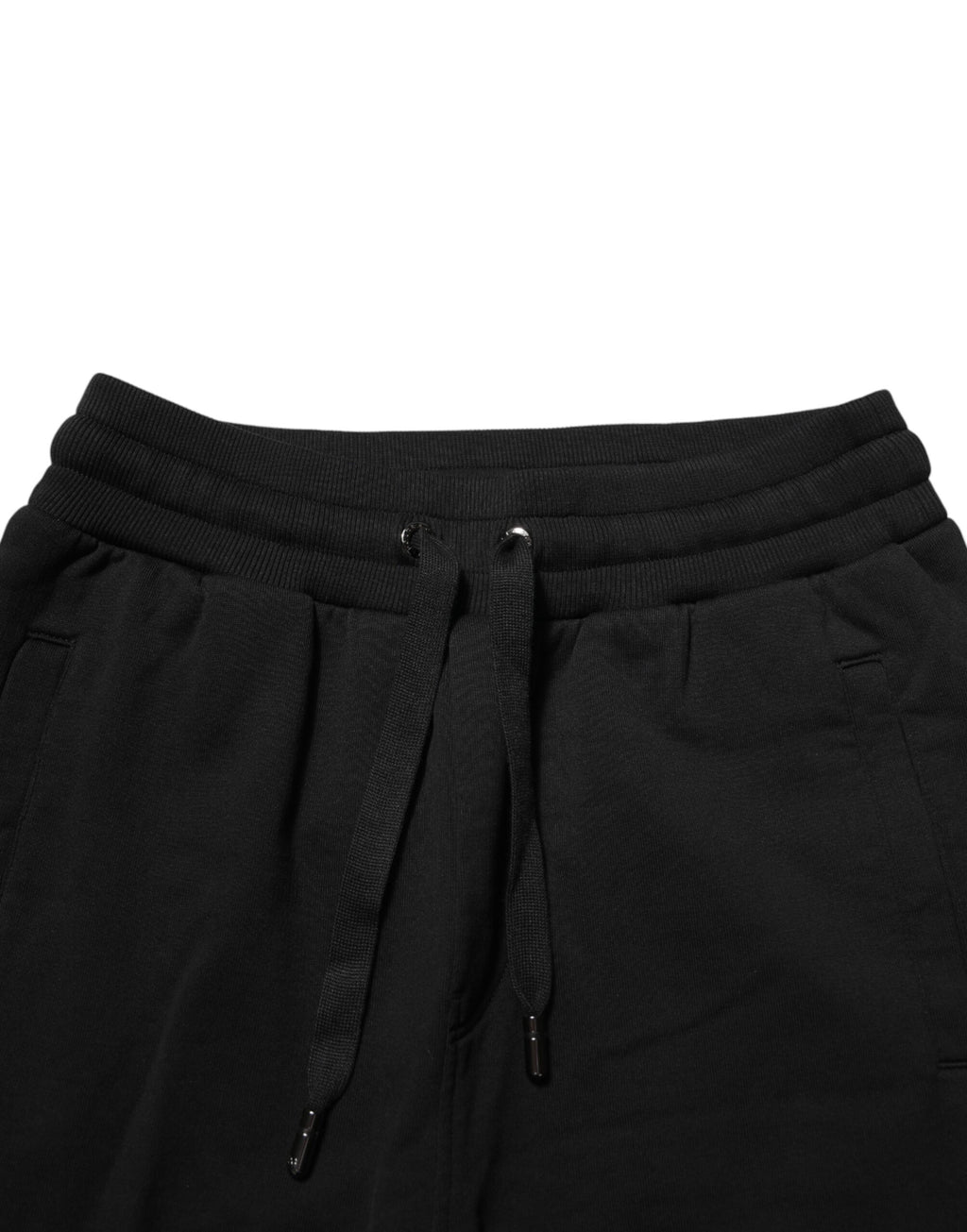 Pantalon de jogging en coton noir Dolce & Gabbana avec logo DG, style décontracté et confortable.