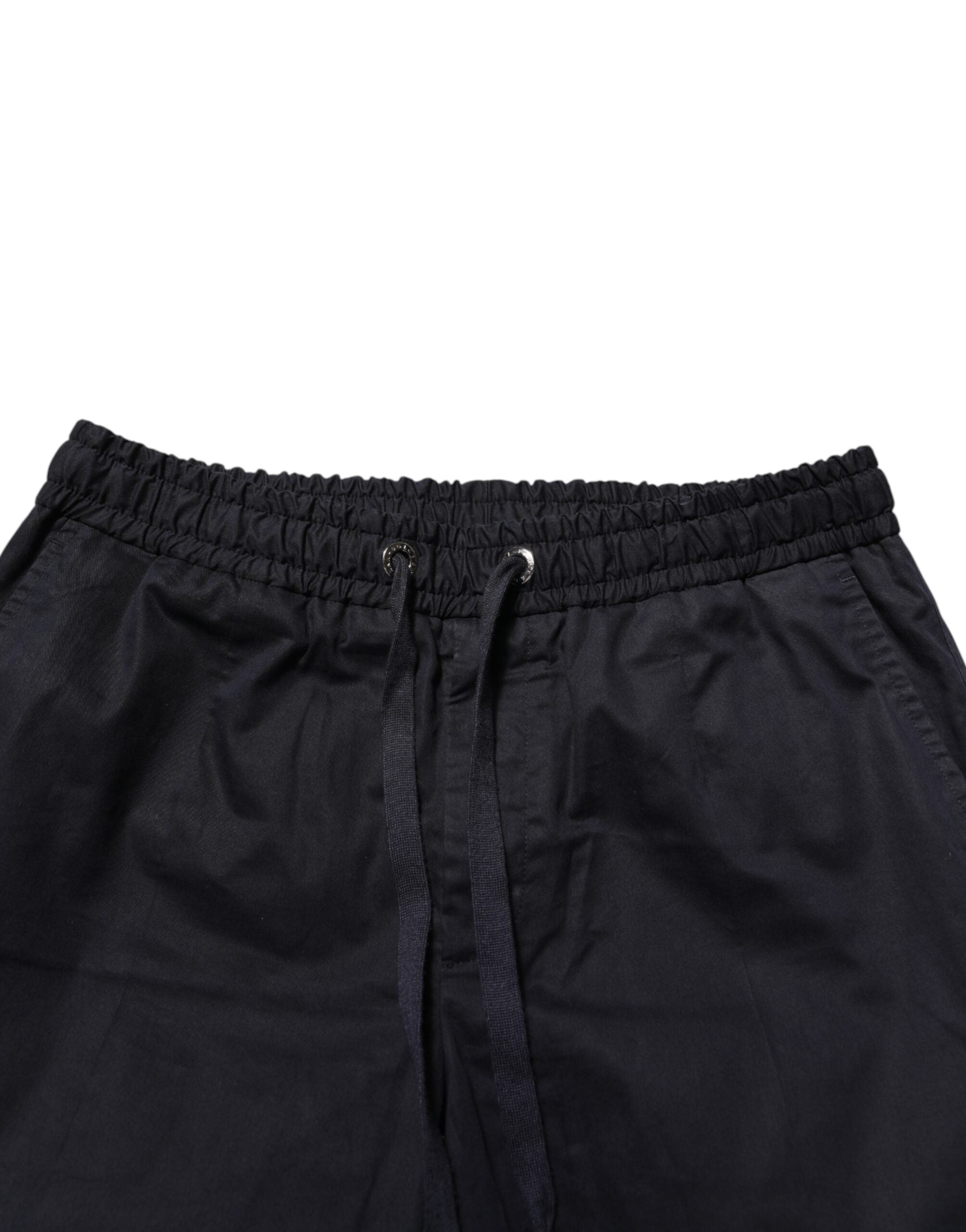 Pantalons jogger pour homme Dolce & Gabbana noirs à taille mi-haute avec cordon de serrage, style décontracté et moderne.