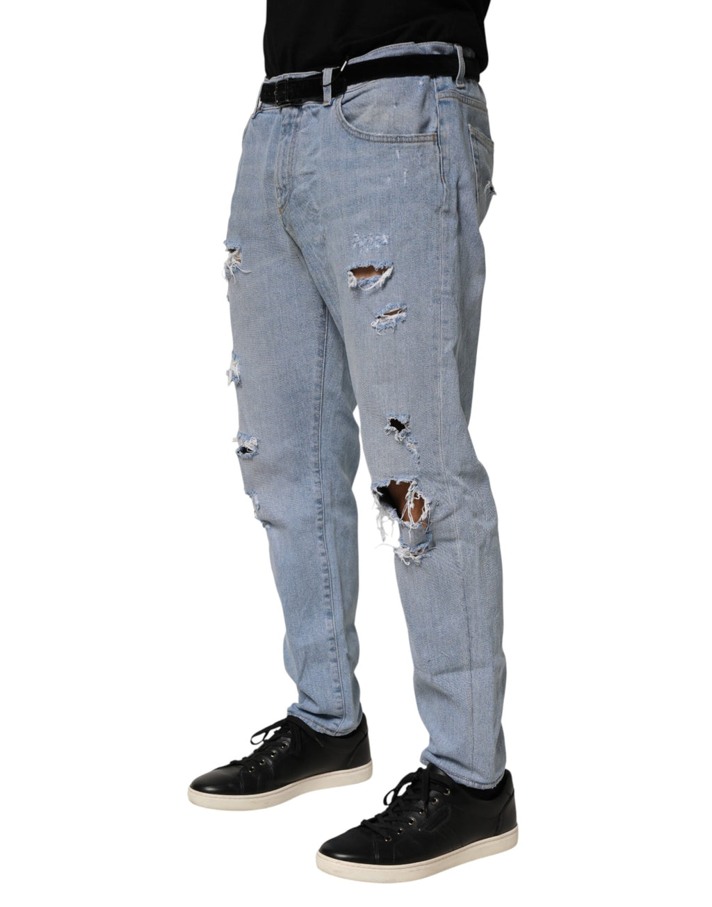 Jeans slim en denim bleu Dolce & Gabbana en coton avec détails déchirés et style ajusté.