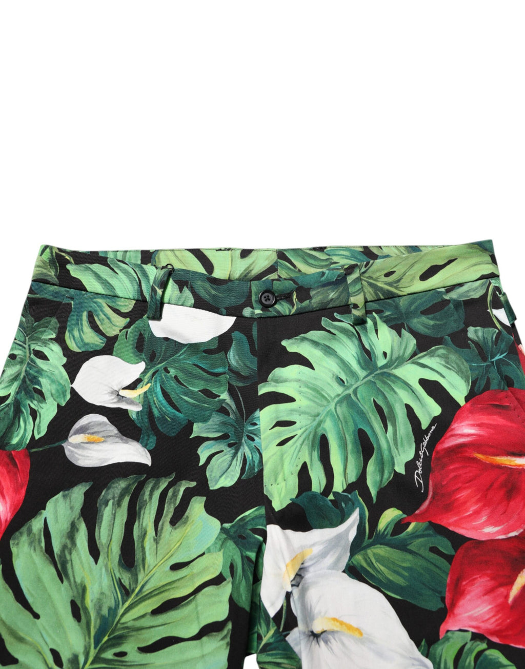 Pantalons en coton à coupe tapered avec motif floral multicolore de Dolce & Gabbana, détails de la couture et design élégant.