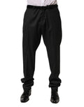 Pantalon formel en laine noire Dolce & Gabbana pour homme, vue de face, avec une coupe élégante et finition soignée.