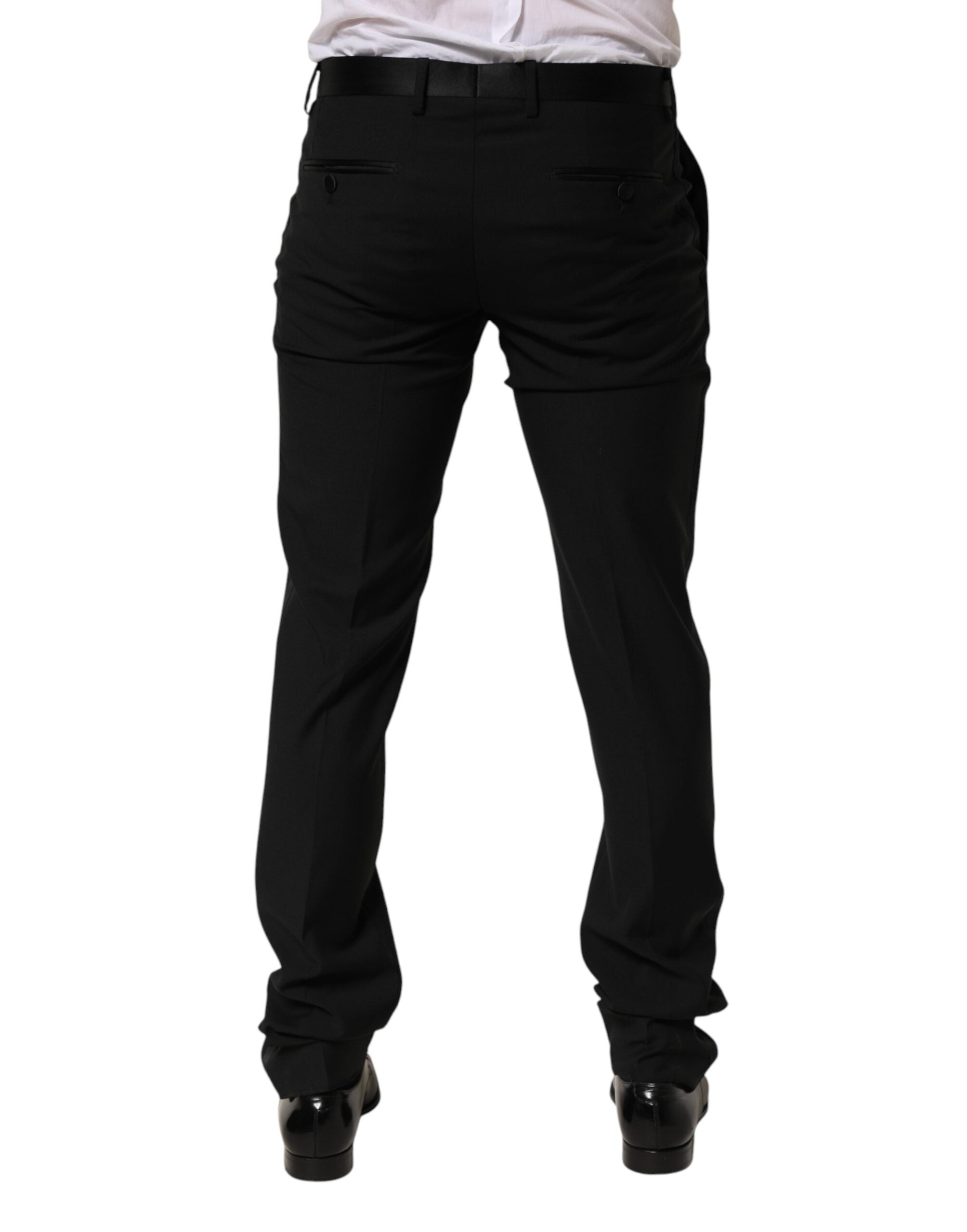Pantalon formel en laine noire Dolce & Gabbana pour homme, élégant et classique, adapté aux occasions habillées.