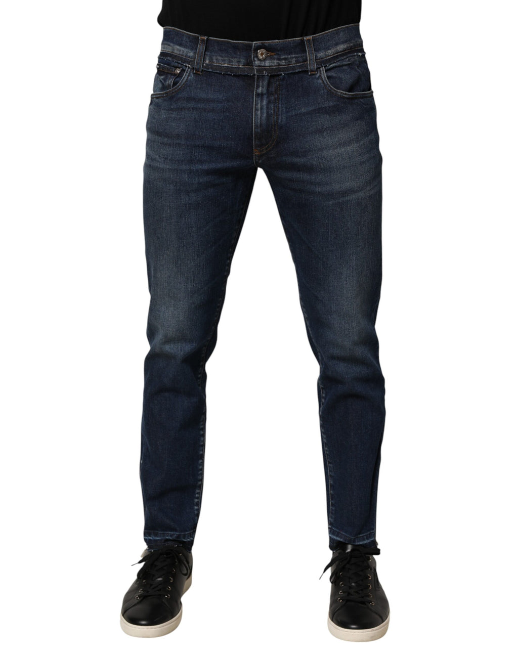 Jeans homme Dolce & Gabbana en denim stretch bleu, coupe skinny, en coton avec détails modernes.