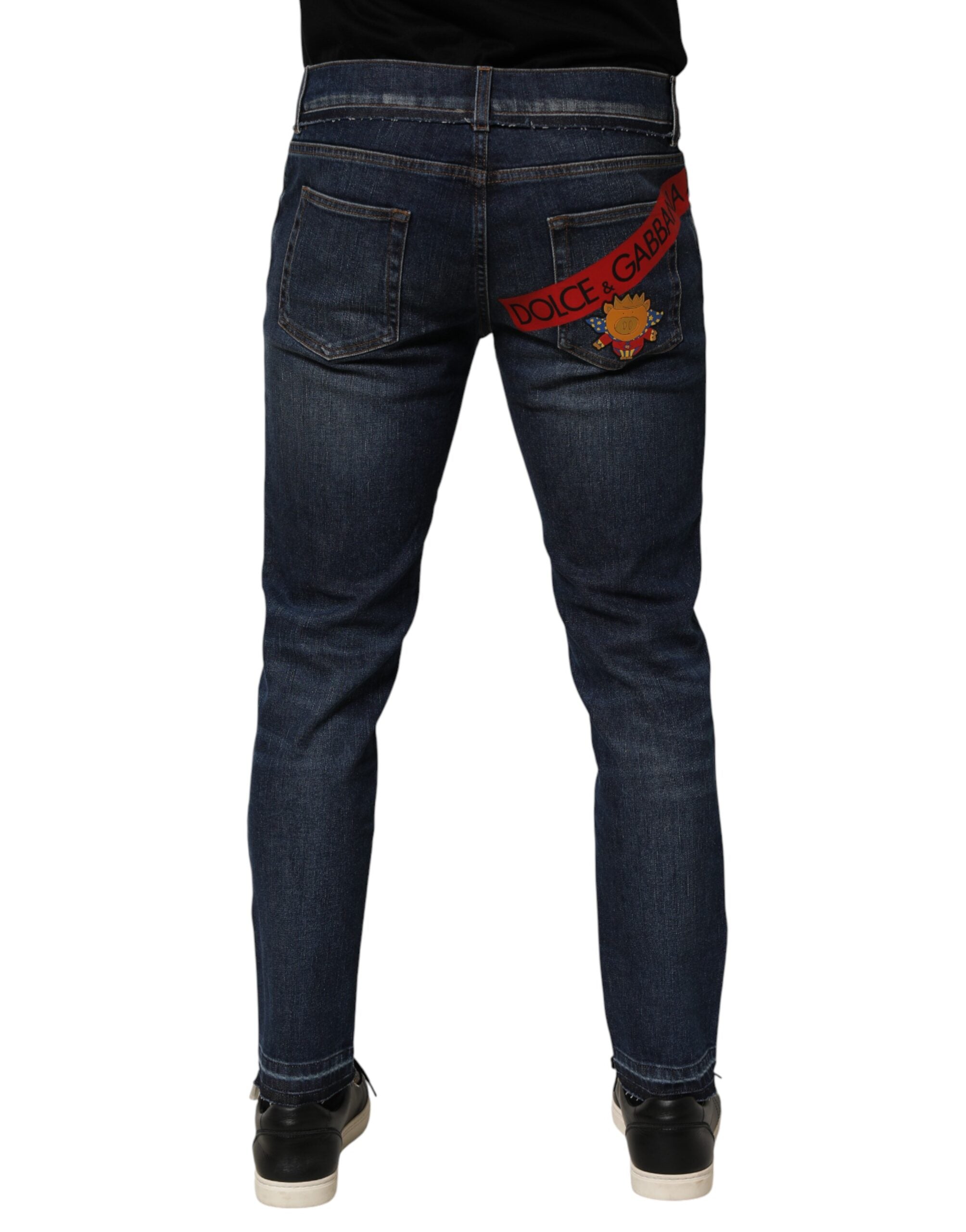 Jean skinny en denim bleu en coton stretch de Dolce & Gabbana pour homme, coupe ajustée et moderne.