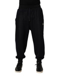 Pantalons jogger Dolce & Gabbana en coton mélangé noir avec cordon de serrage, style décontracté et confortable.