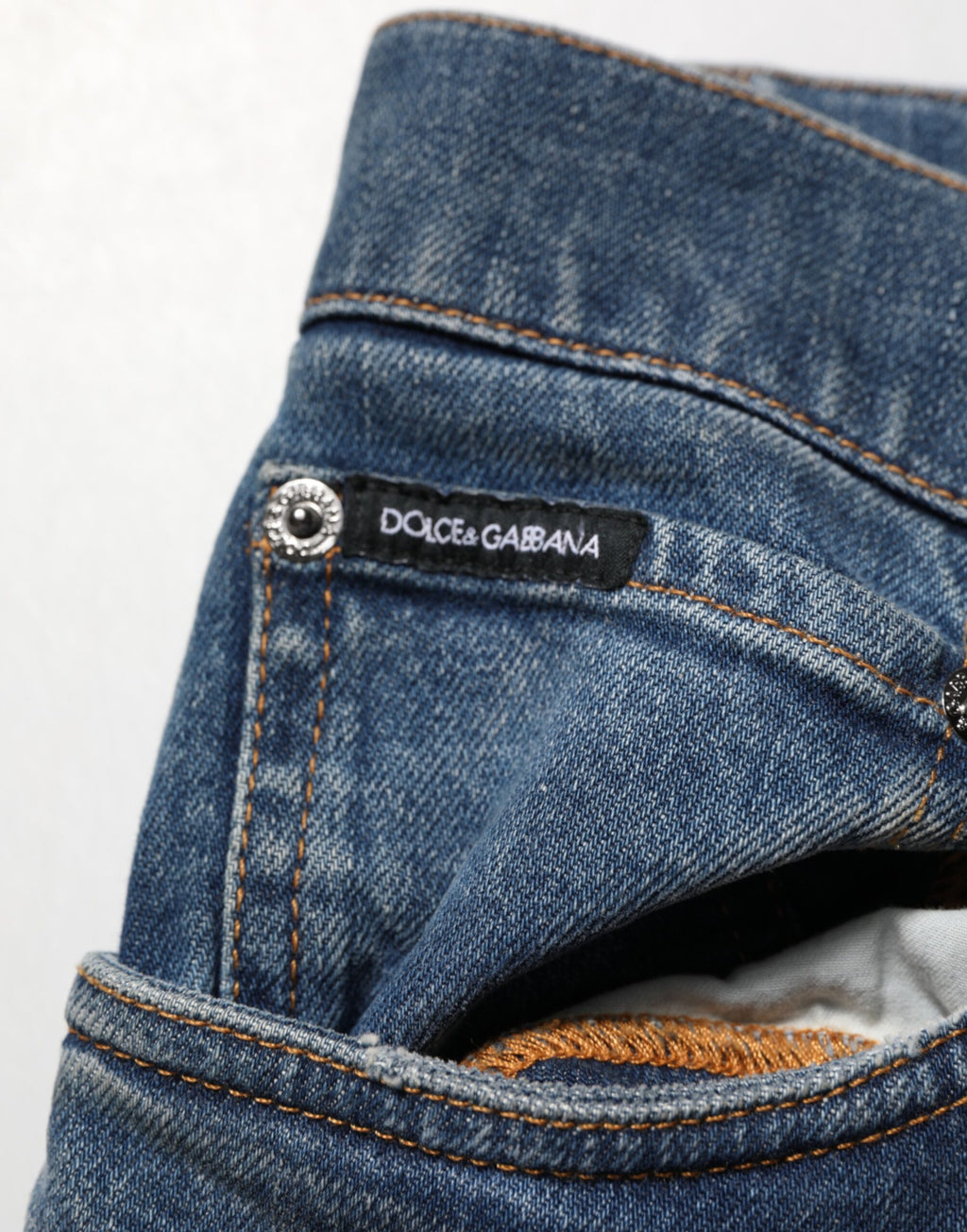 Jeans skinny en denim coton déchiré bleu de Dolce & Gabbana pour homme, style décontracté et tendance.