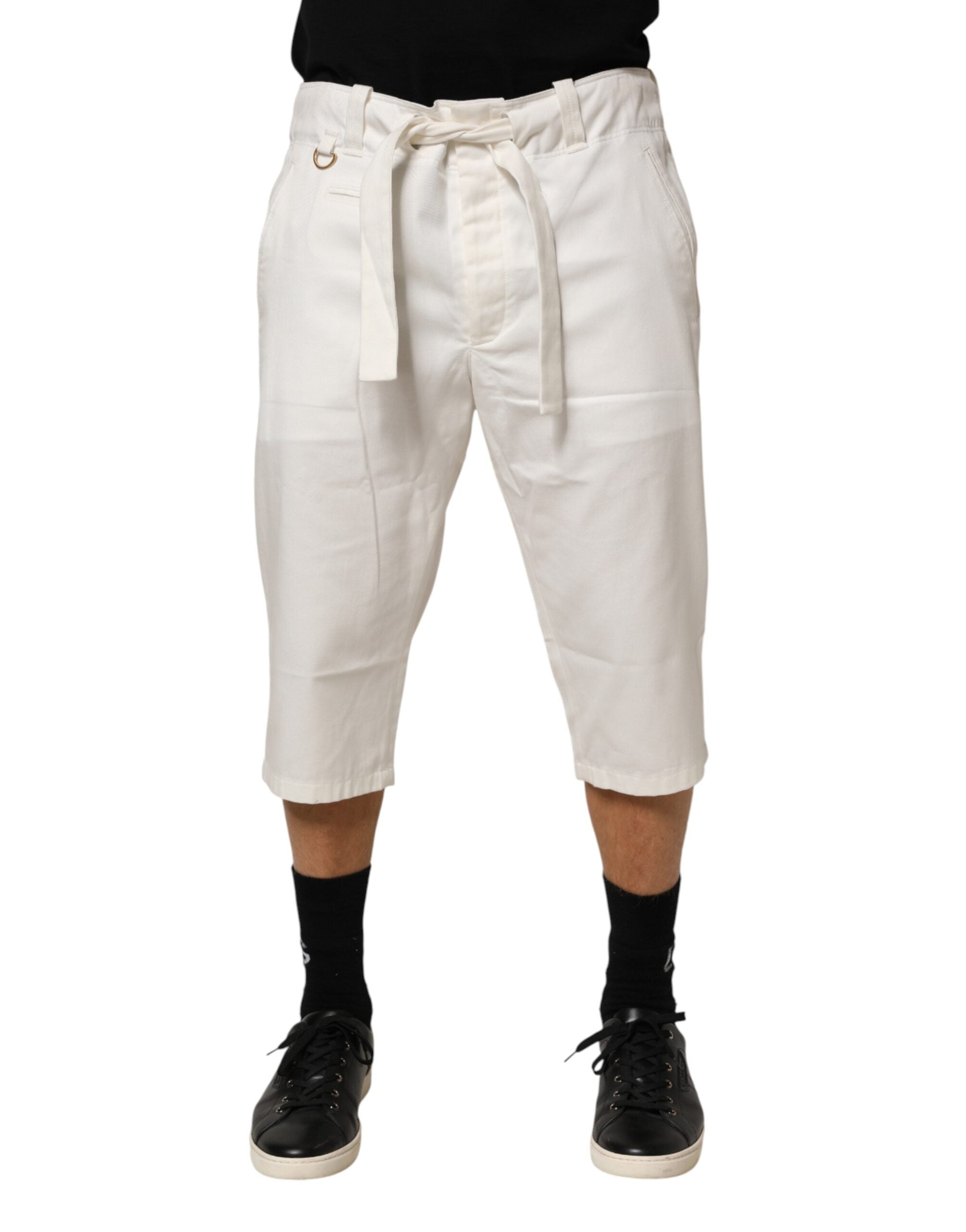 Pantalon cropped en coton stretch blanc de Dolce & Gabbana, style élégant et ajusté, visible avec une coupe moderne.