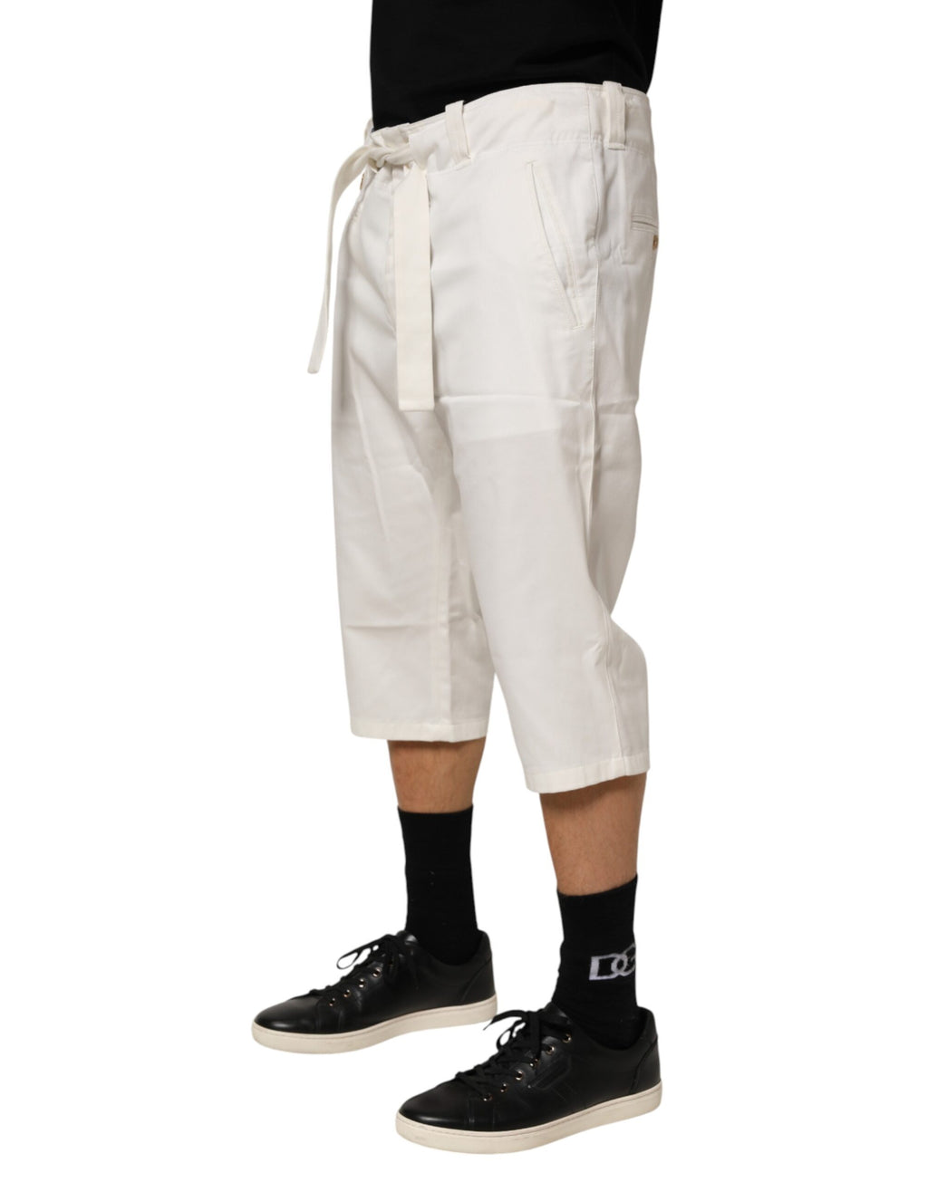 Pantalon cropped en coton blanc stretch de Dolce & Gabbana, pantalon élégant pour femme, visible avec détails de coupe.