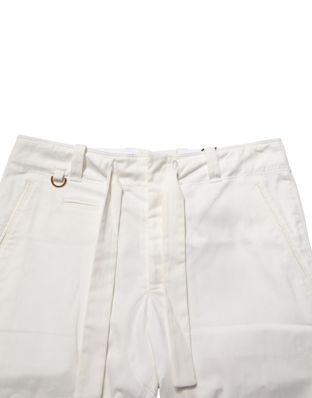 Pantalons cropped en coton stretch blanc de Dolce & Gabbana, style élégant et moderne, visible avec ceinture et coupe ajustée.