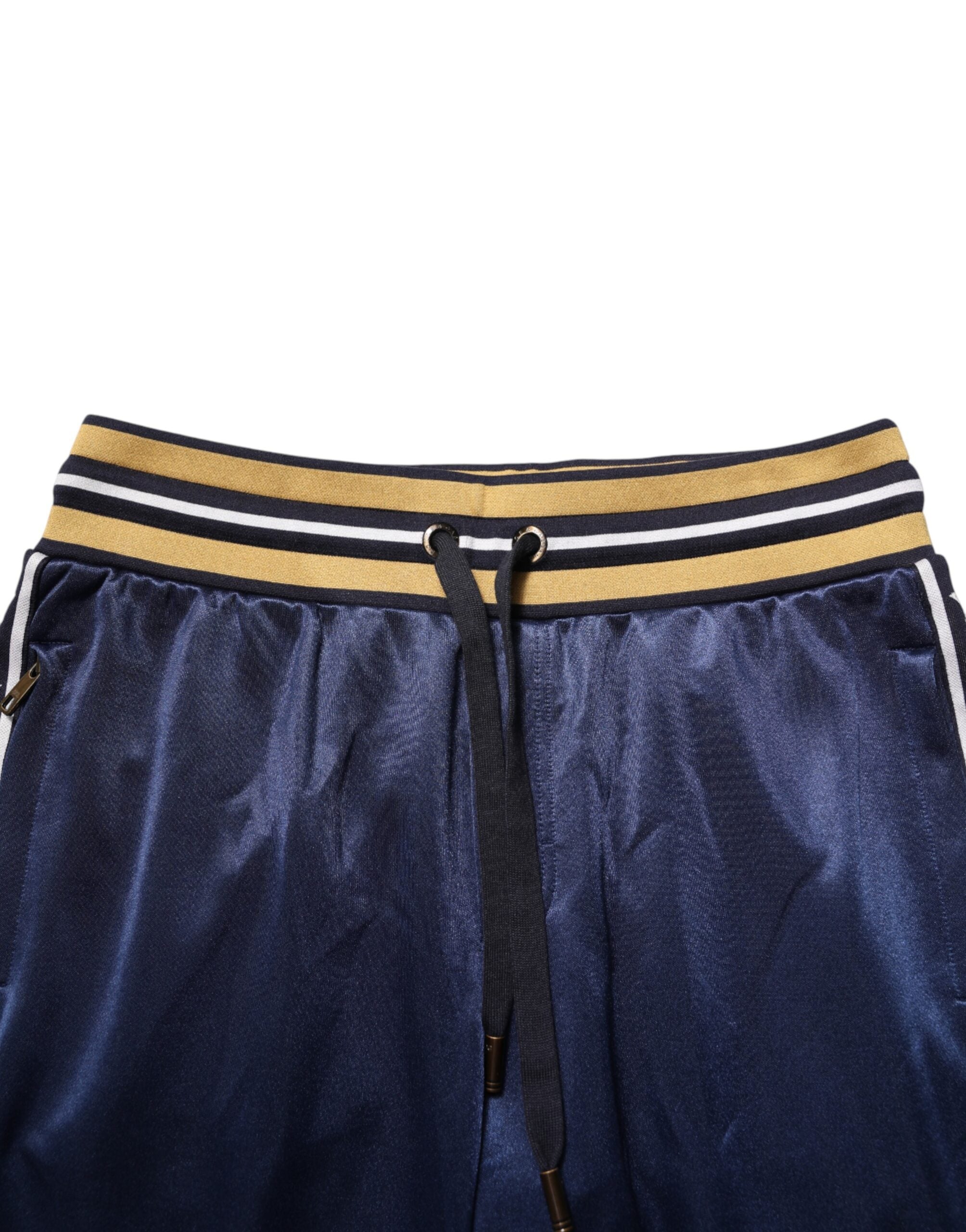 Pantalon de jogging en nylon bleu Dolce & Gabbana, taille mi-haute, style décontracté et moderne.