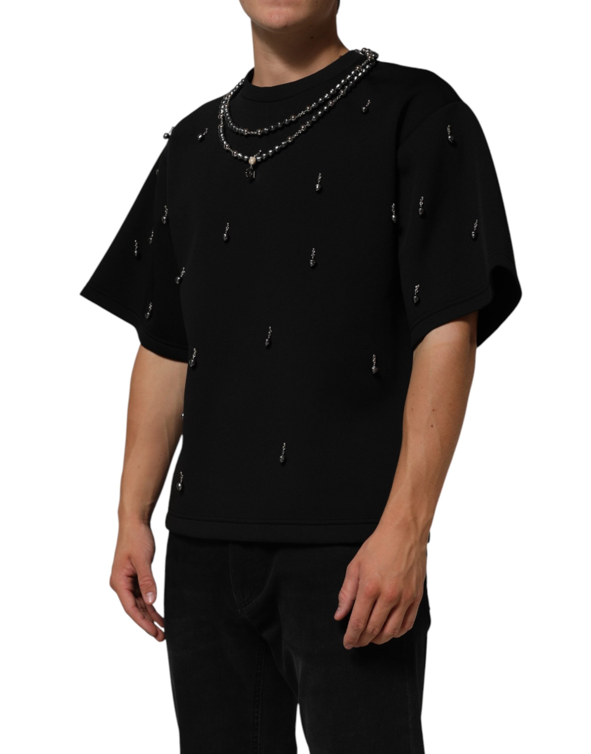 T-shirt noir en polyester Dolce & Gabbana avec col orné de bijoux, style chic et élégant.